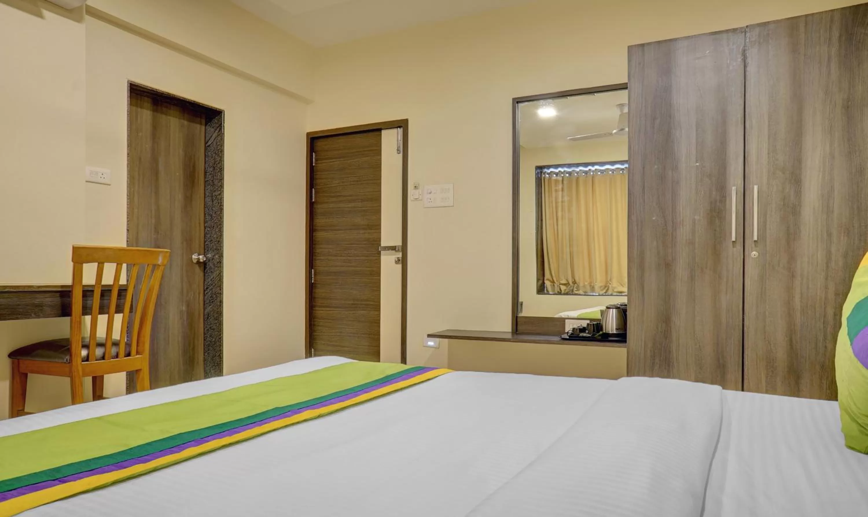 Bedroom, Bed in Treebo Bhagyashree Executive
