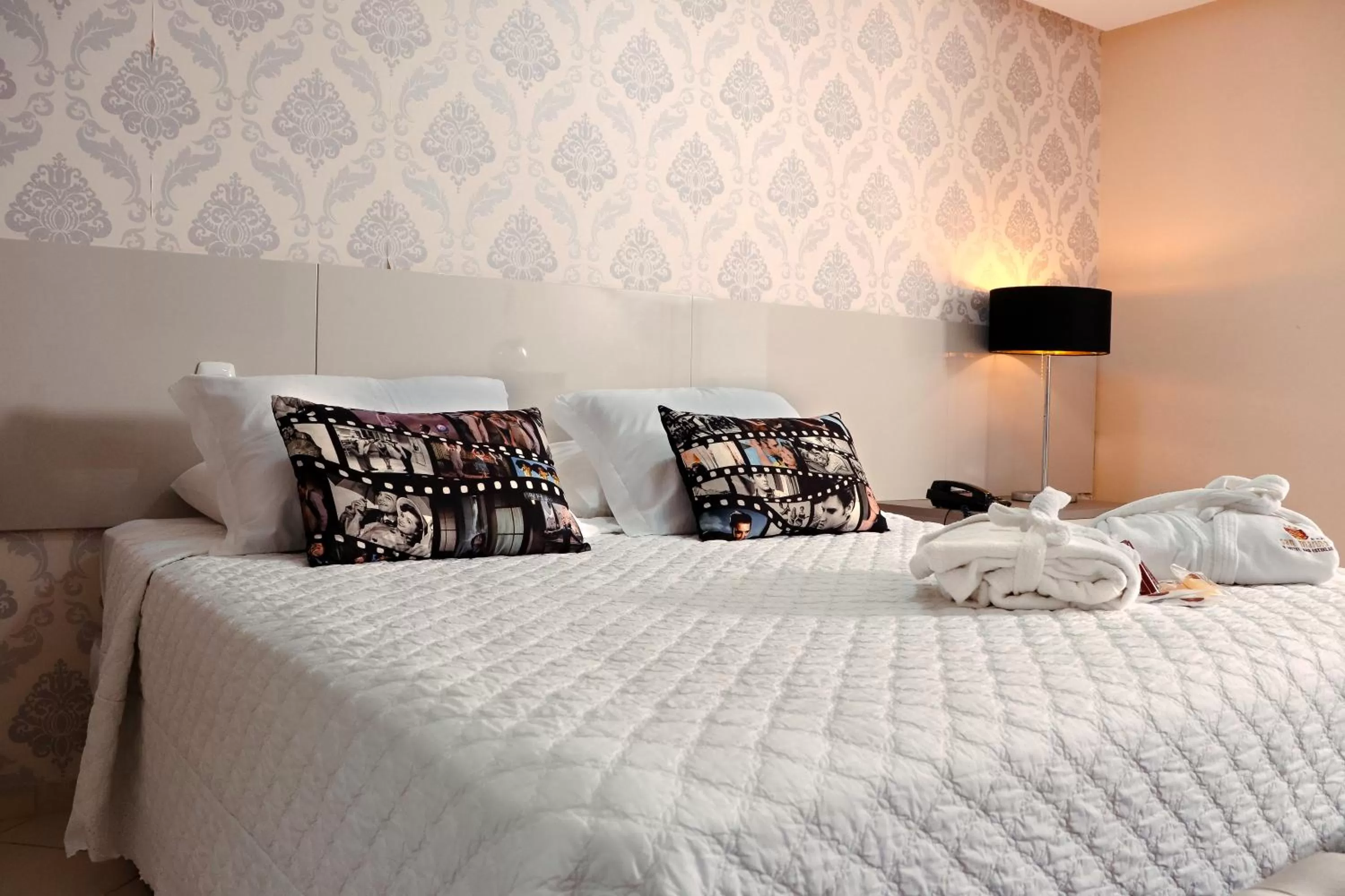 Bed in San Marino Hotel