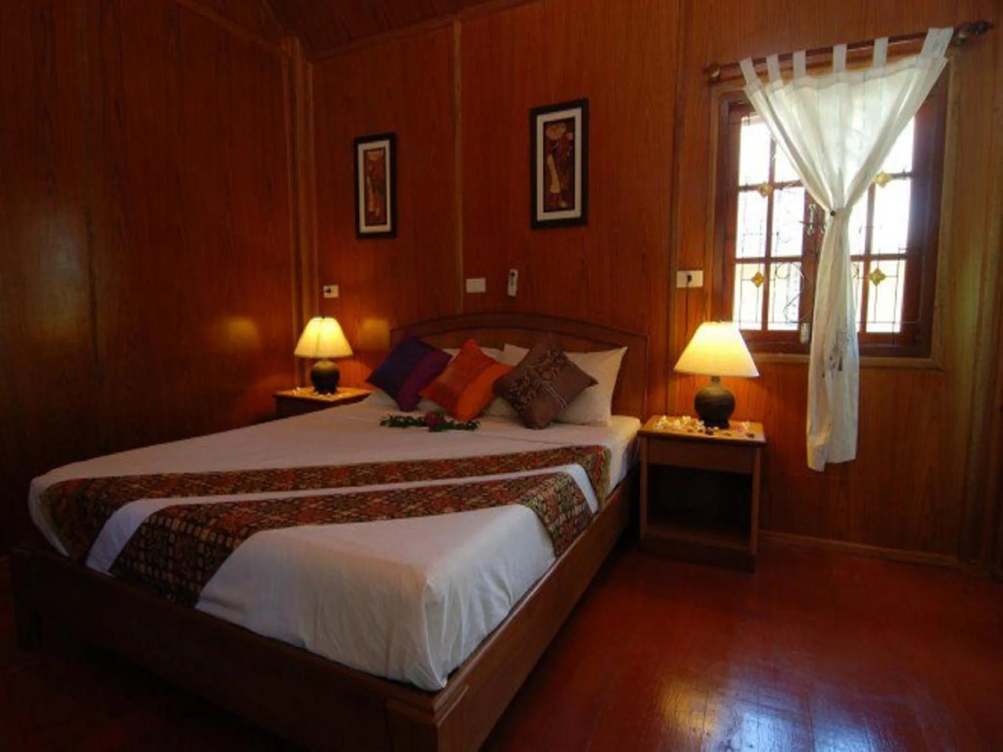 Bed in Sayang Beach Resort Koh Lanta