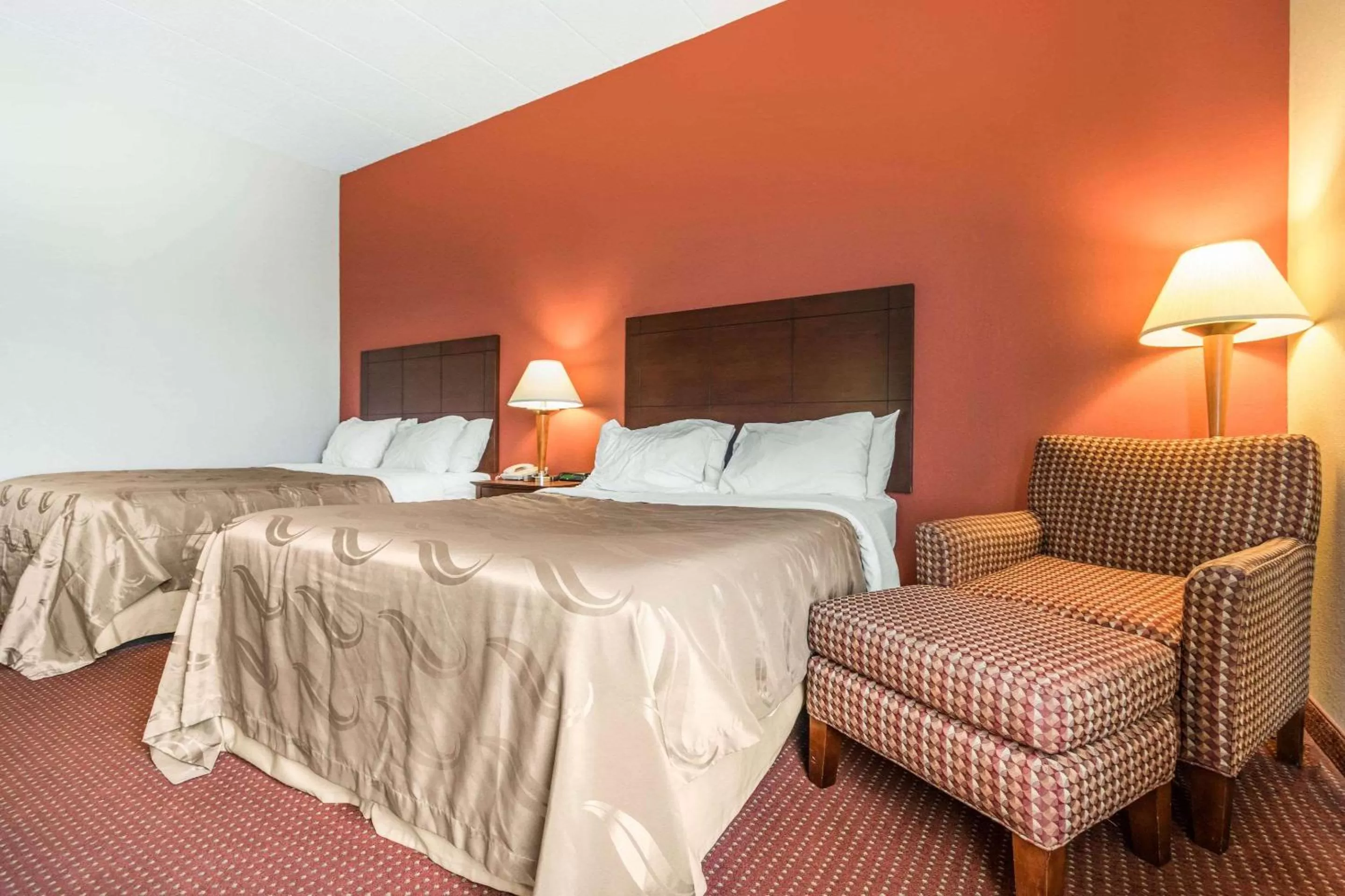 Bed in Quality Inn & Suites Lawrenceburg