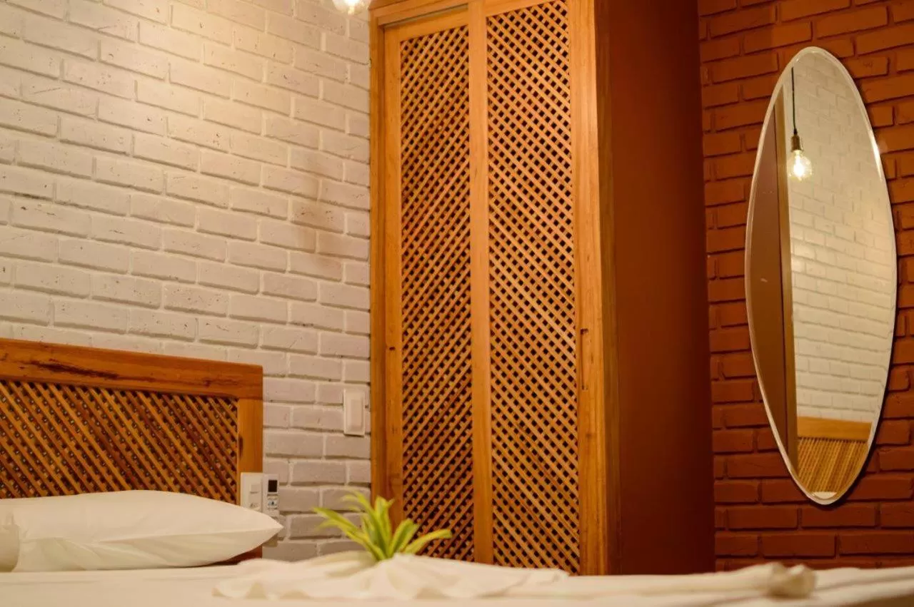 Bed in Hotel Vento Brasil