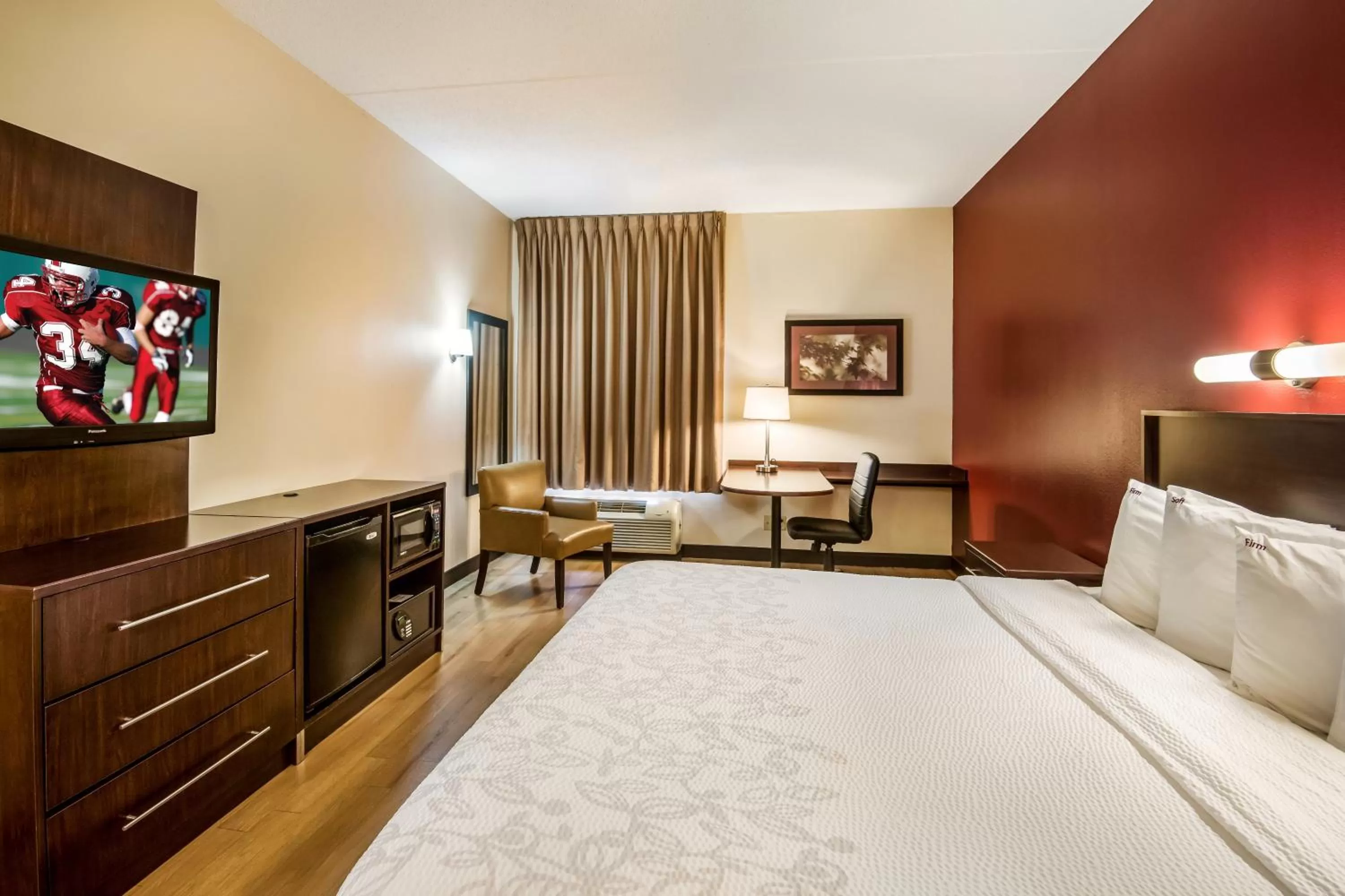 Photo of the whole room, Bed in Red Roof Inn PLUS Raleigh Downtown NCSU Conv Center