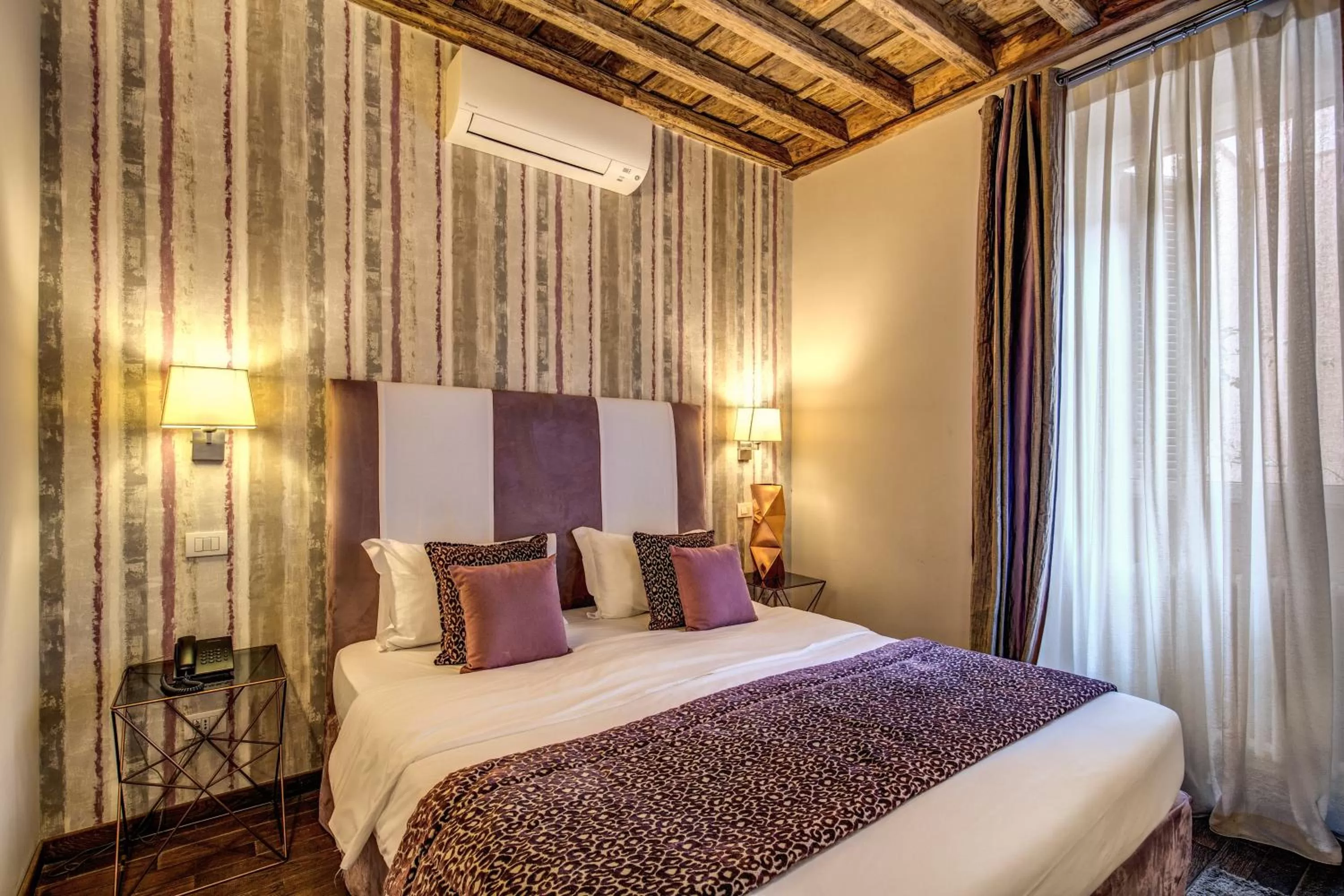 Bed in Trevi Beau Boutique Hotel