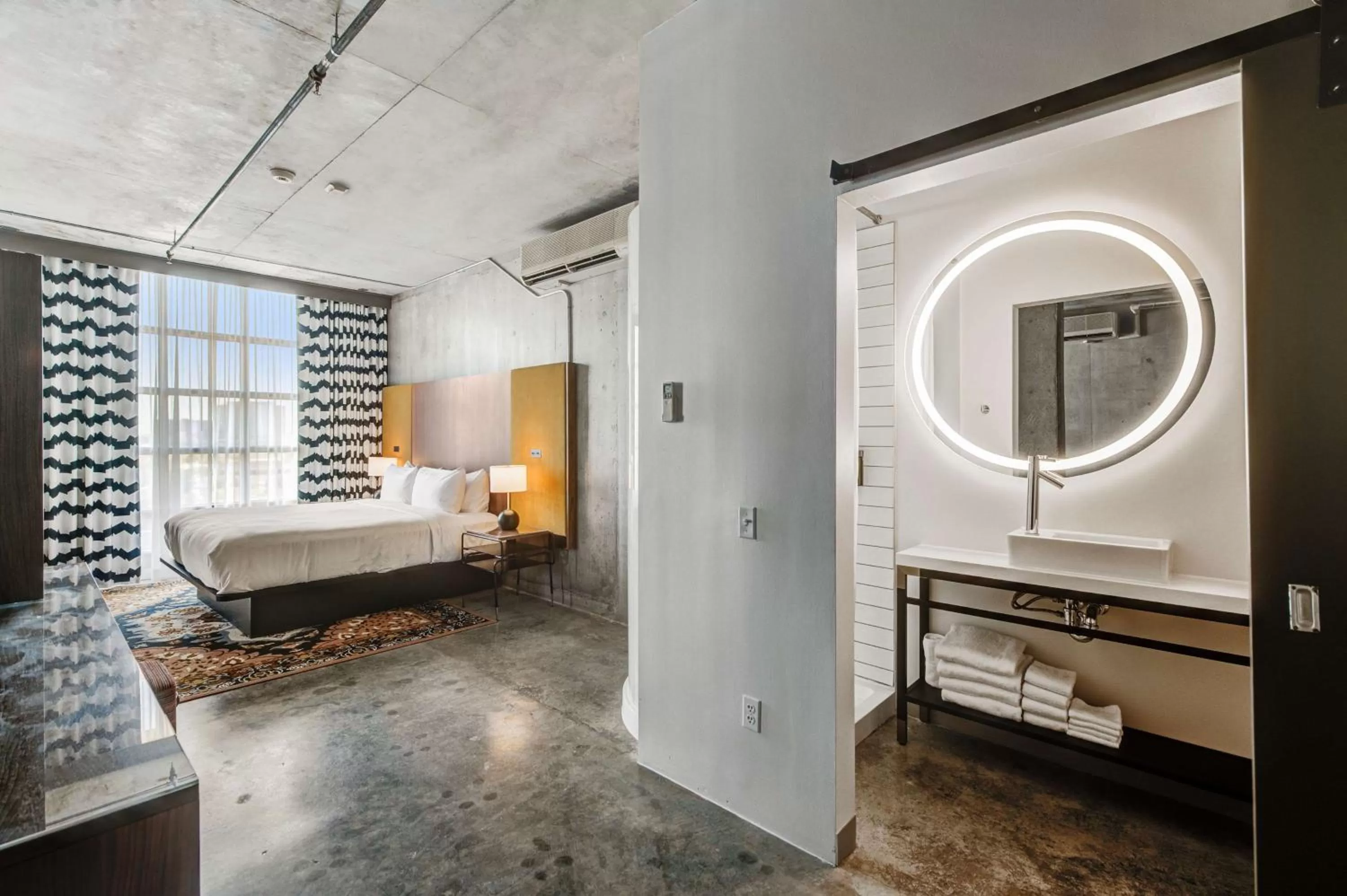 Bed in NYLO Dallas Plano Hotel, Tapestry Collection by Hilton