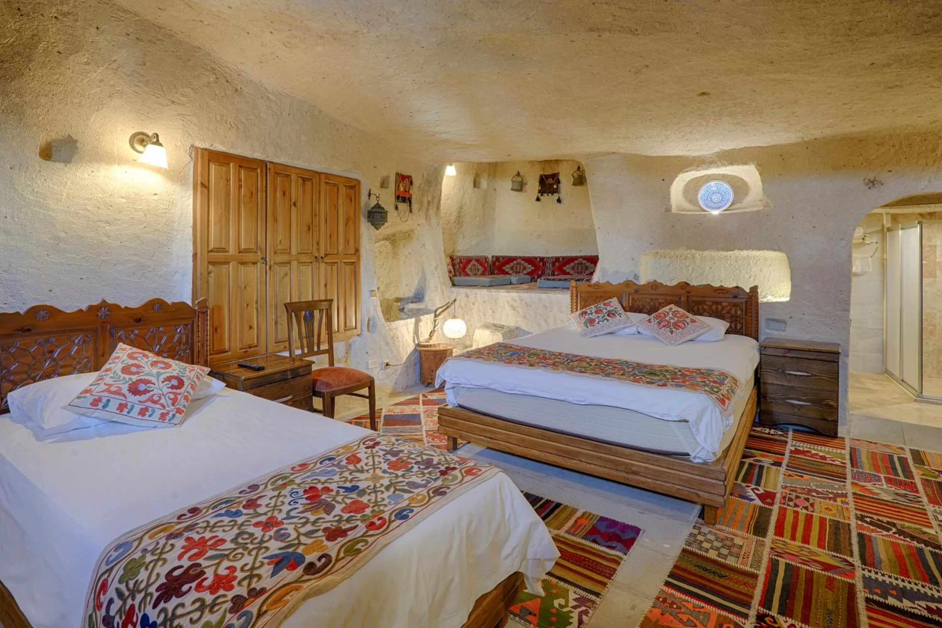Bed in Tulip Cave Suites