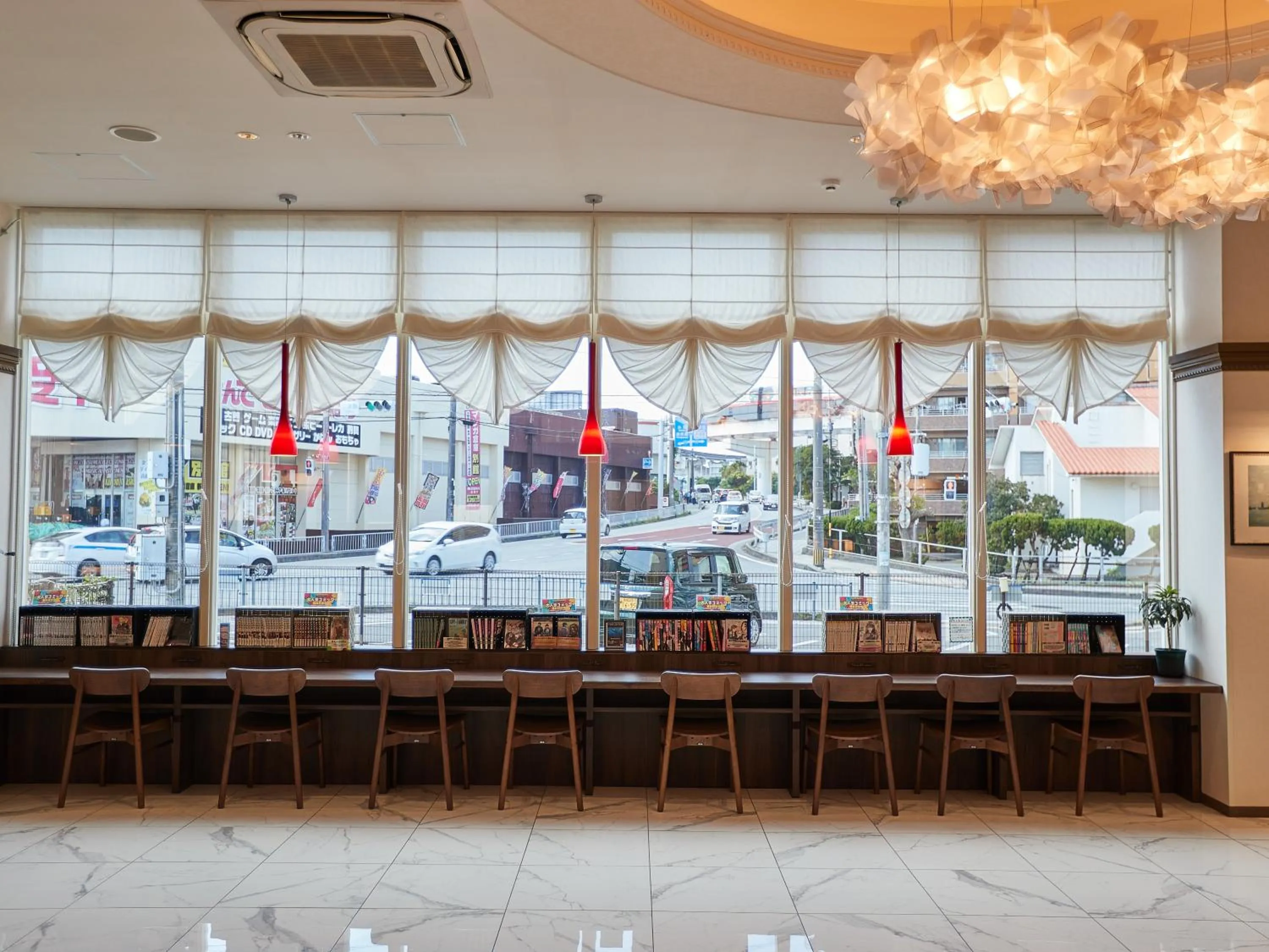 Communal lounge/ TV room in Grand Cabin Hotel Naha Oroku