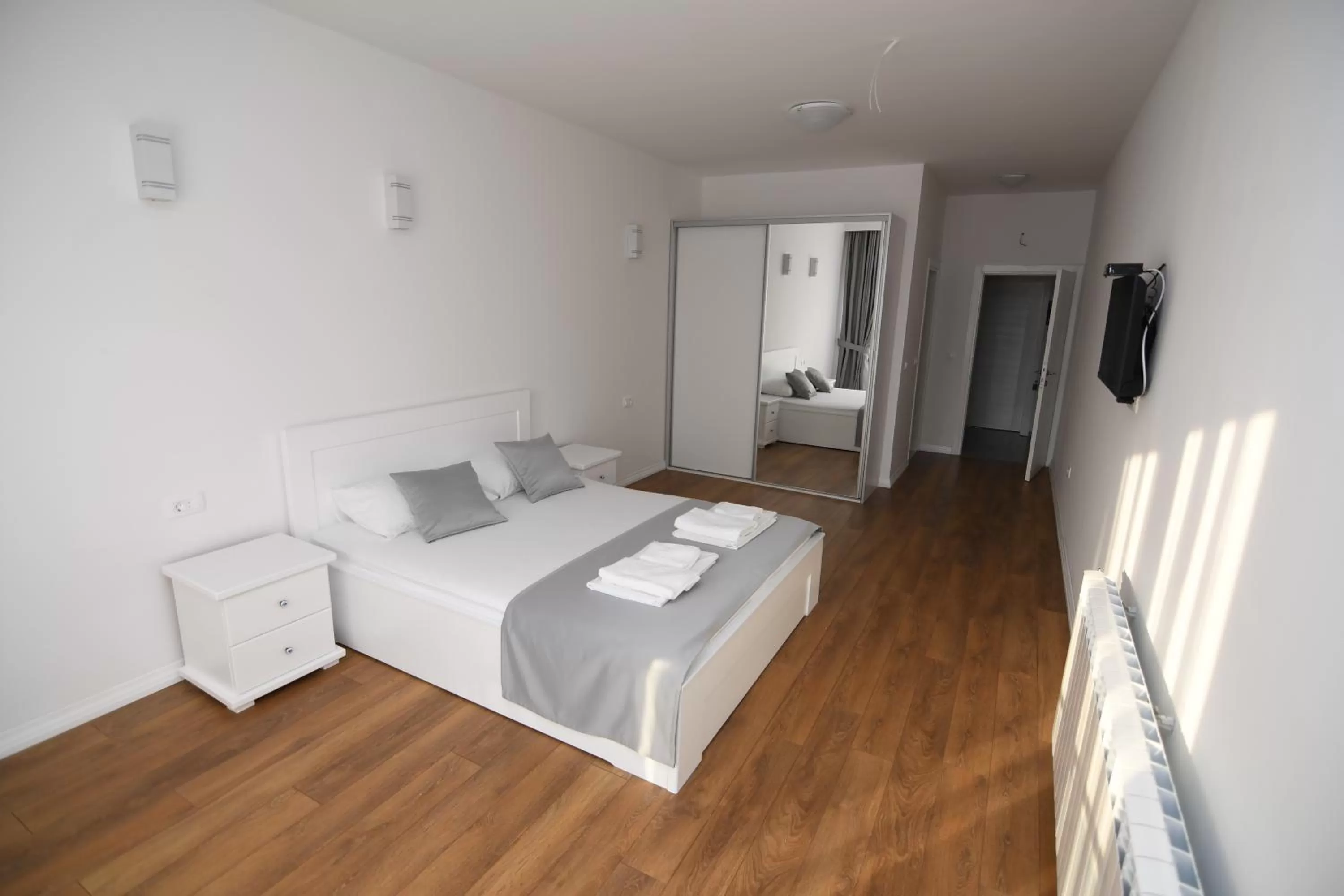 Bed in Elan Luxury Apartments & Lounge Bar