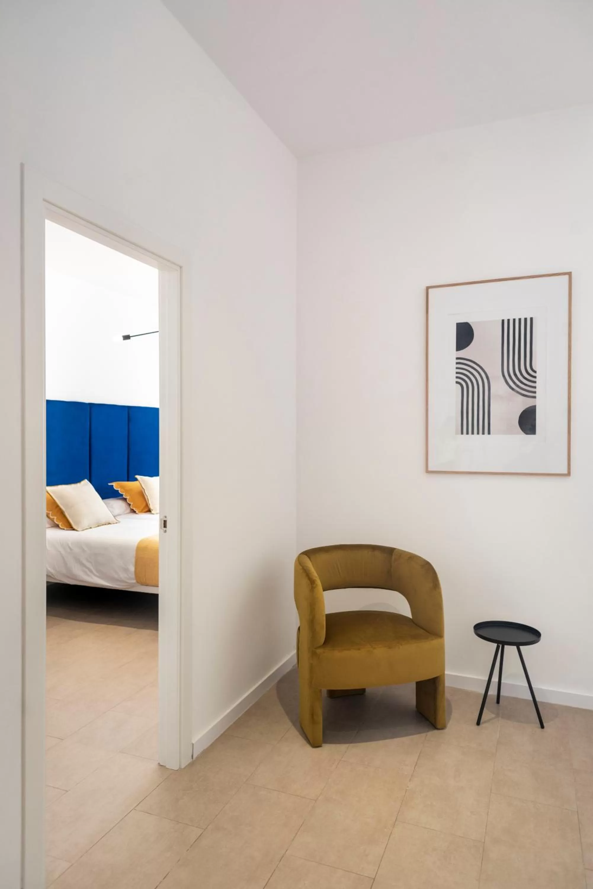 Bed, Seating Area in Blanq Marina Suites