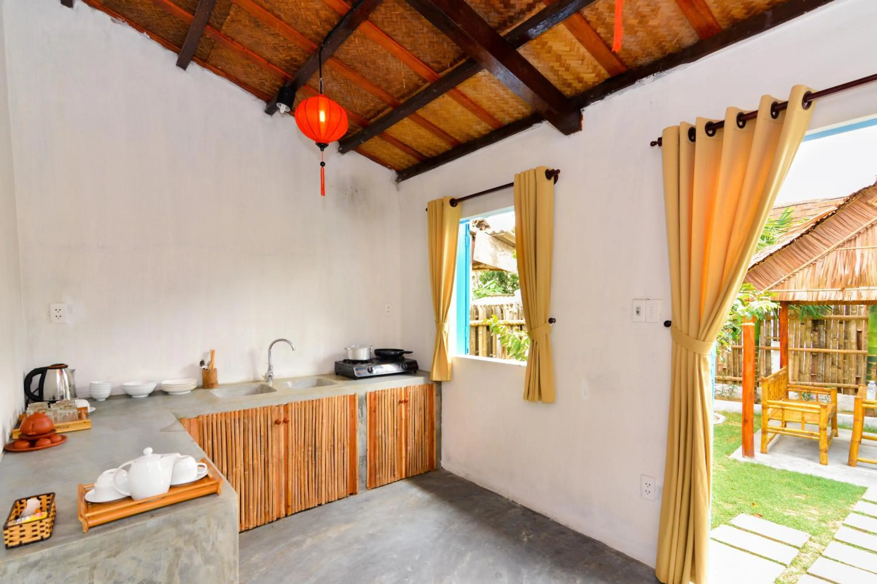 Kitchen or kitchenette in Local Beach Homestay