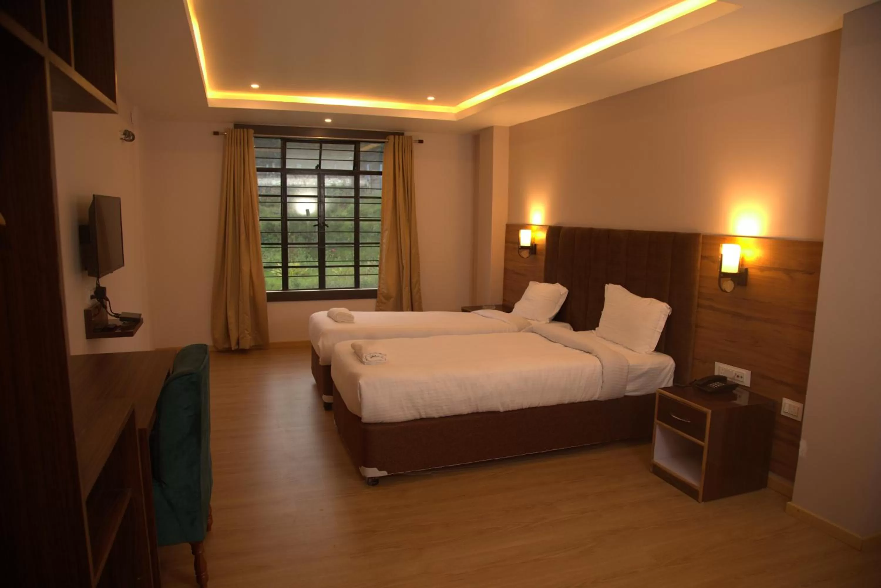 Bed in The Phoenix Residency