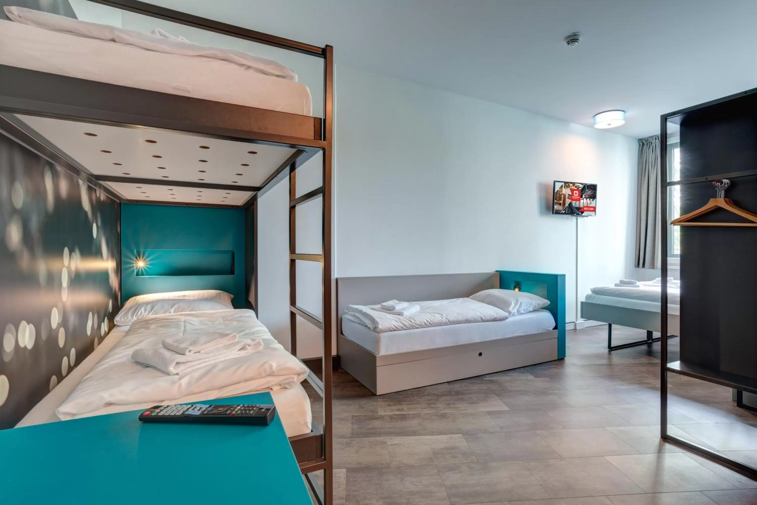 Photo of the whole room, Bed in MEININGER Hotel München Olympiapark