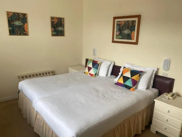 Bed in Runnymede Court Hotel