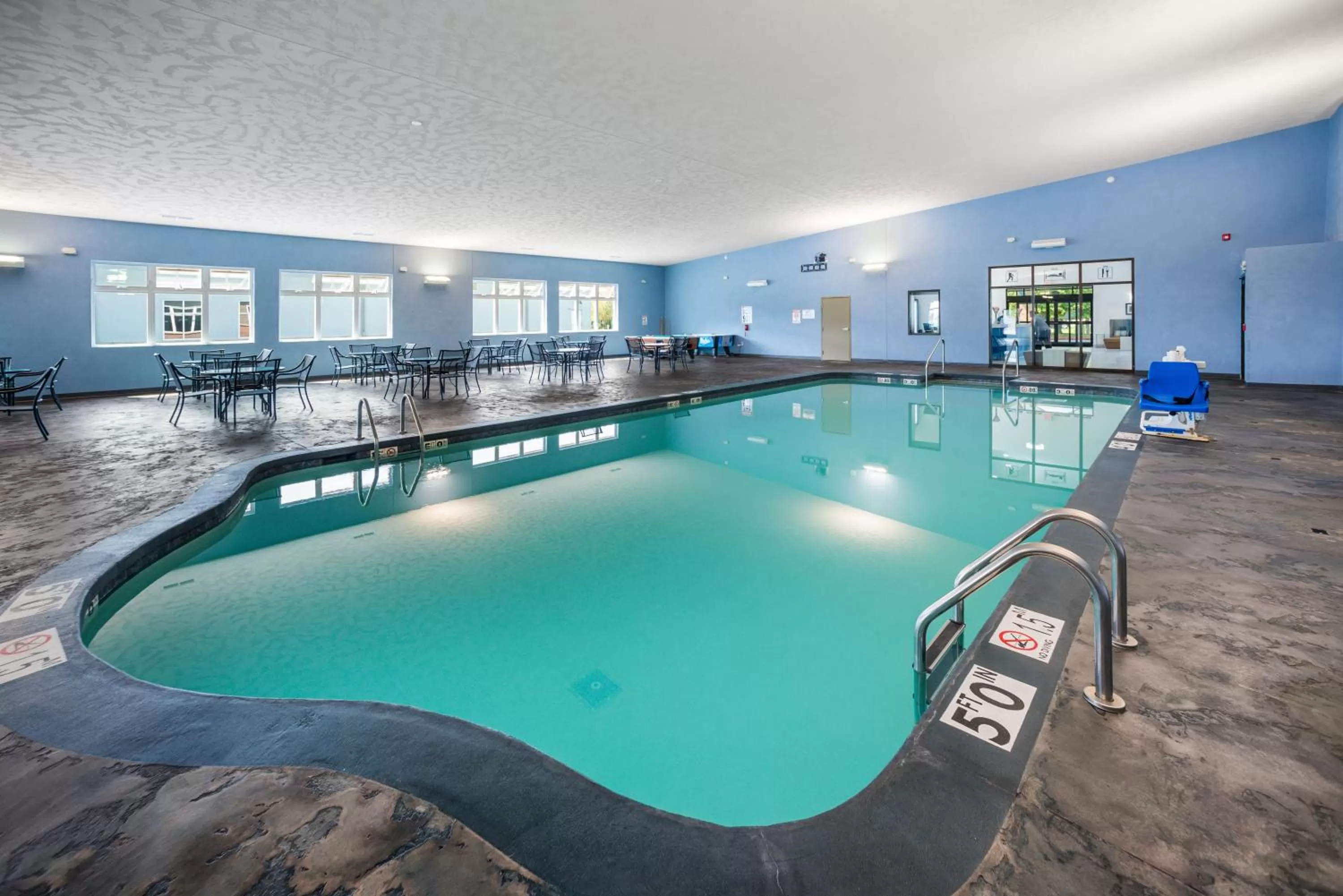 Swimming pool in AmericInn by Wyndham Green Bay Near Stadium
