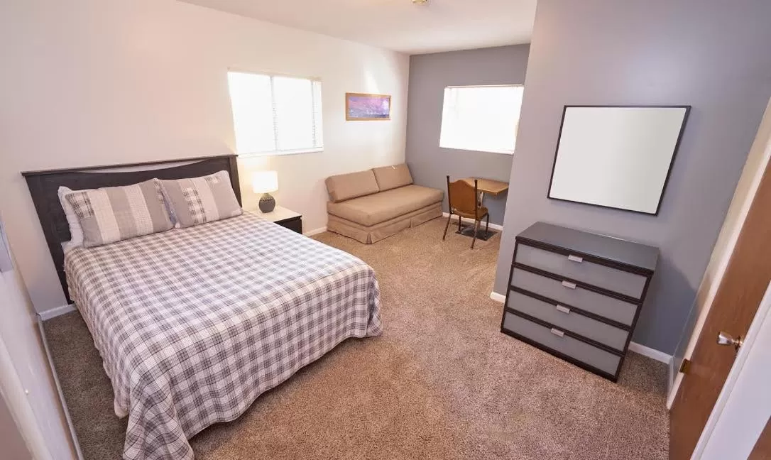 Bed in Chateau Apres Lodge