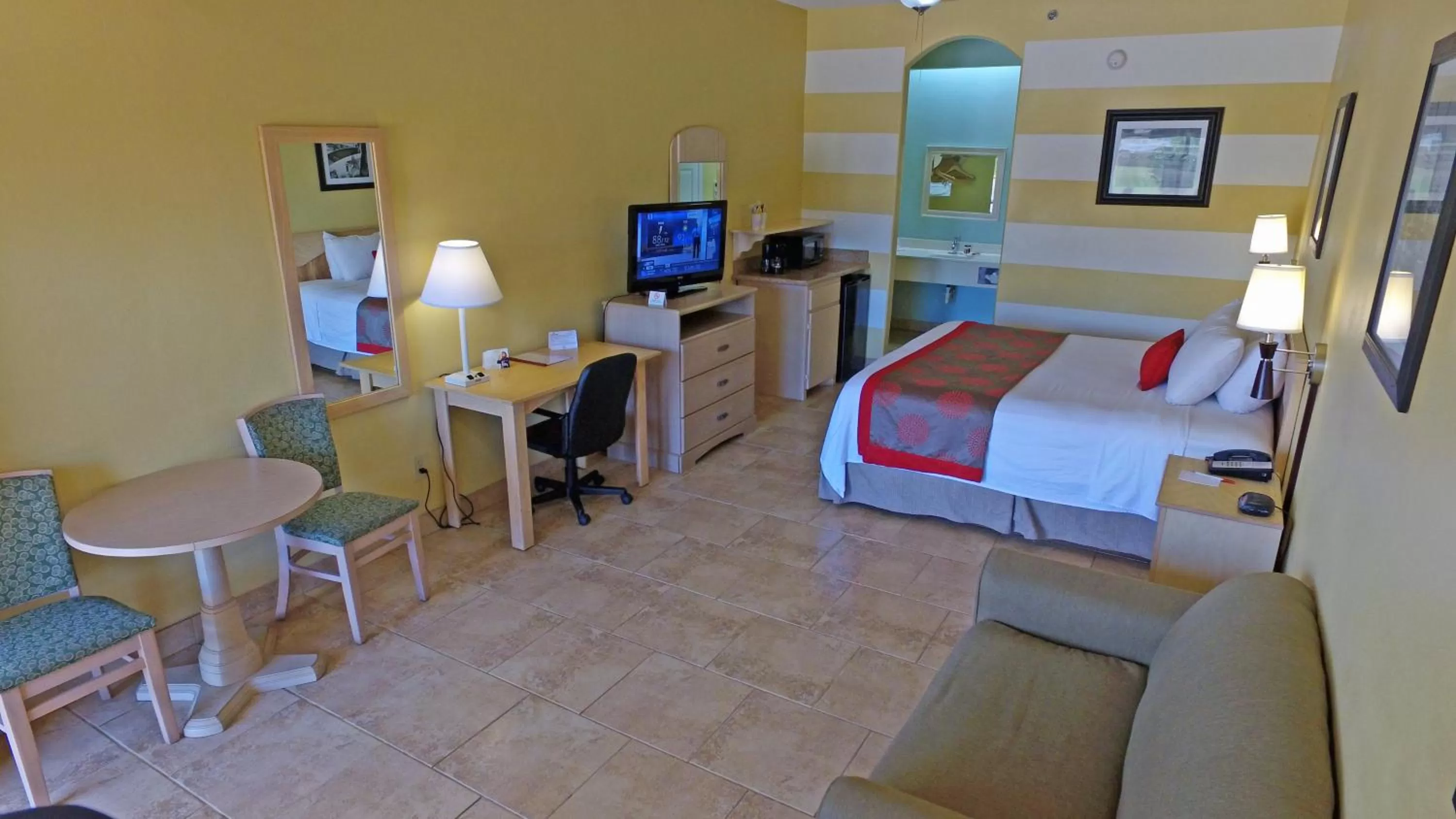 Bedroom, Bed in Ramada by Wyndham & Suites South Padre Island