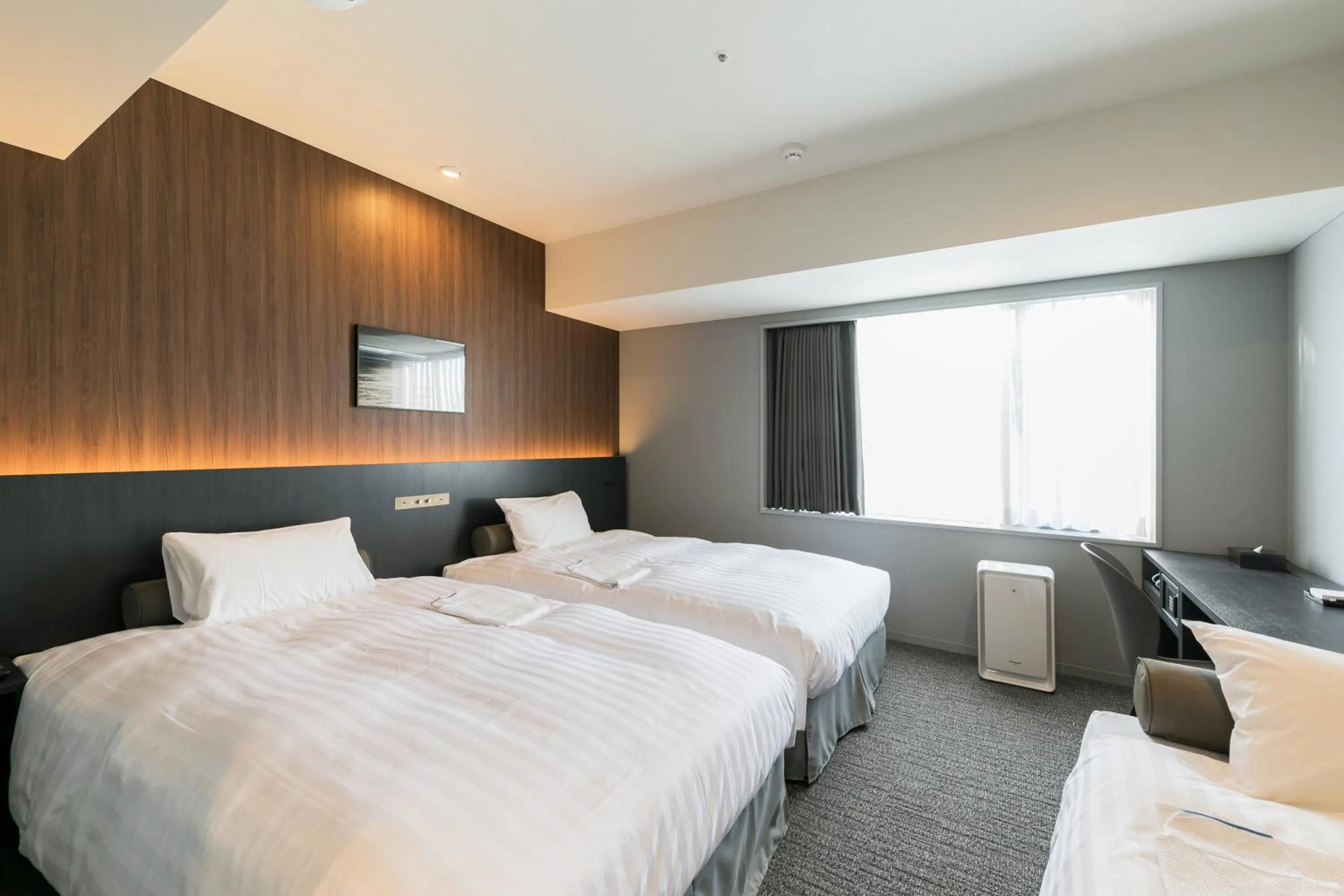 Bed in Ginza Capital Hotel Moegi