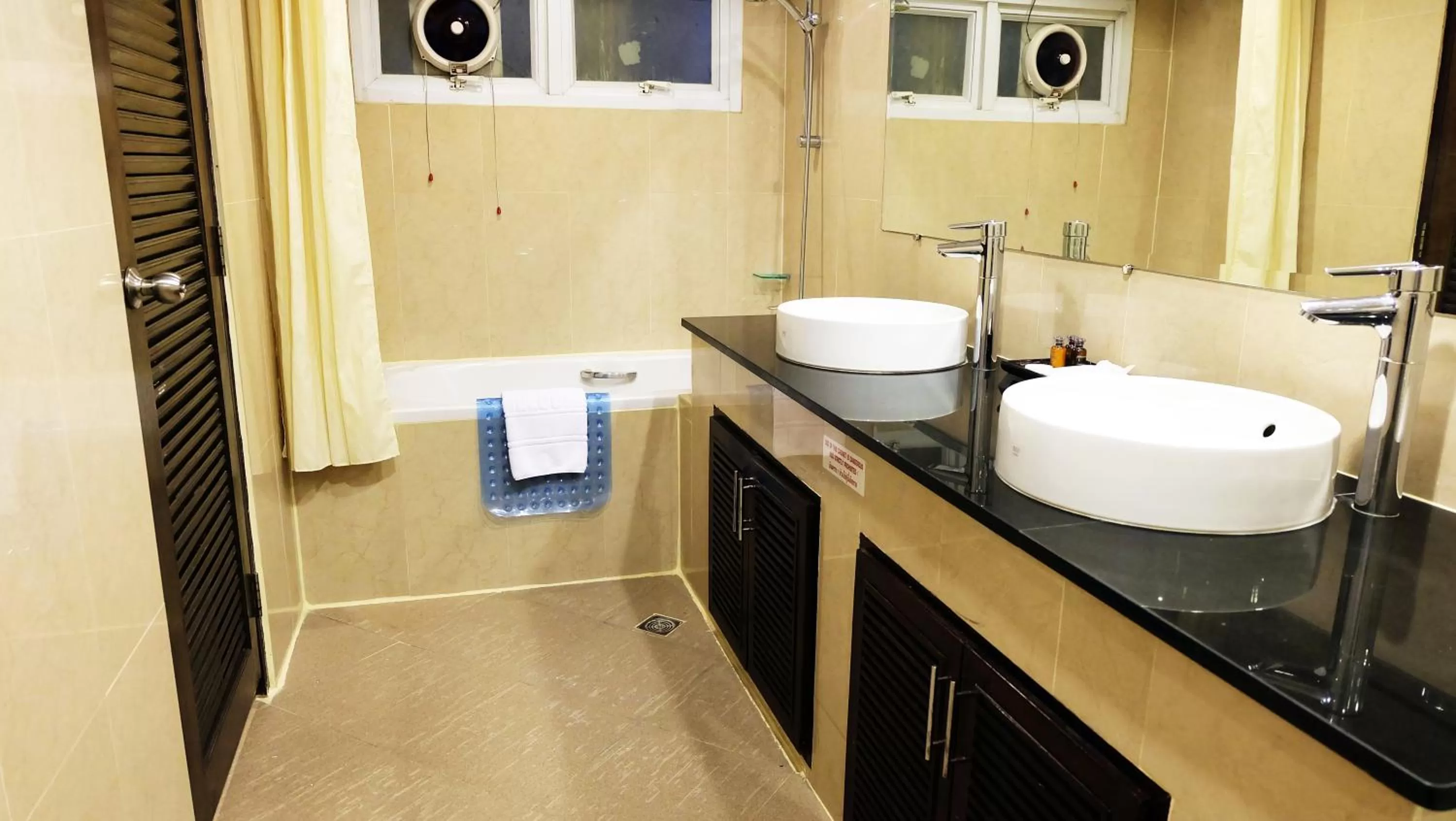 Bathroom in Grand Business Inn