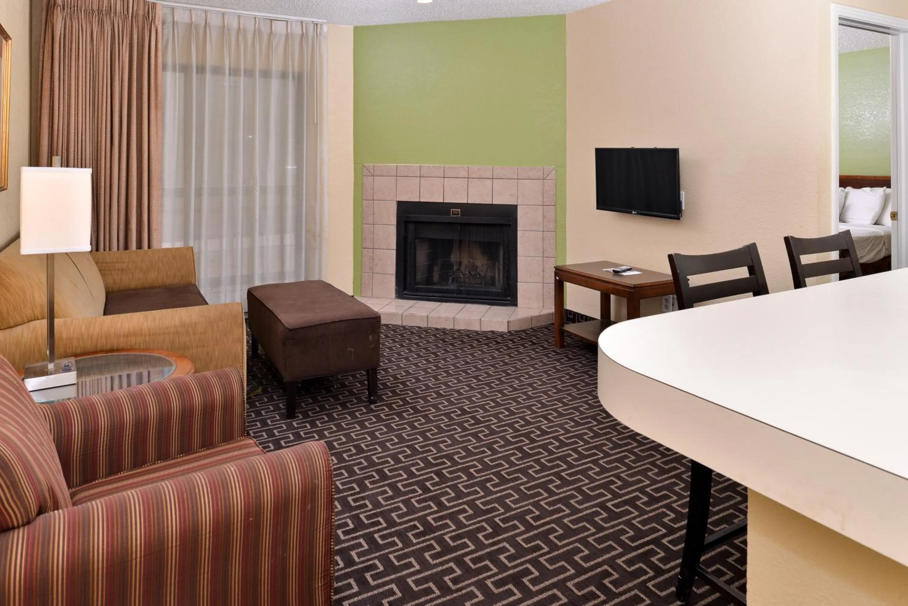 Living room in Americas Best Value Inn & Suites Extended Stay - Tulsa