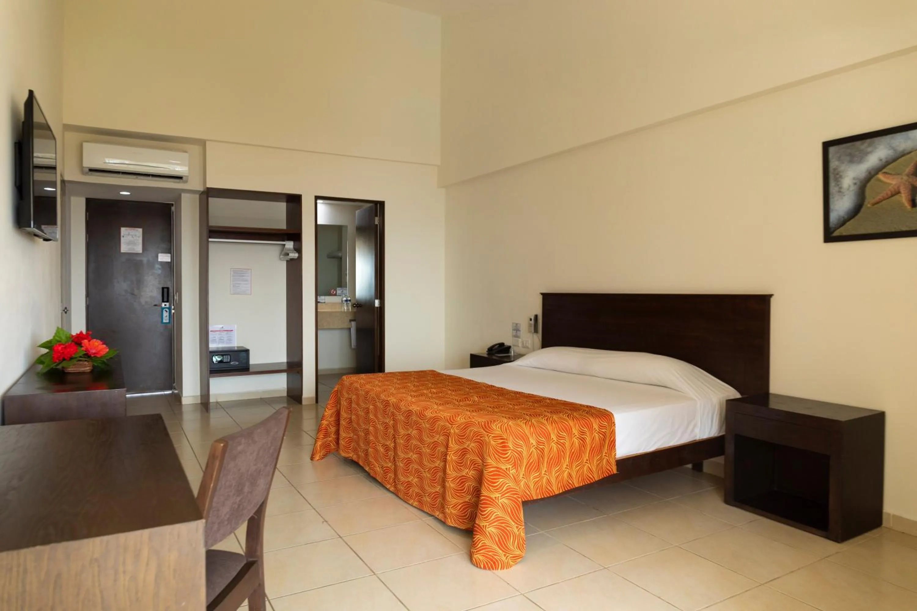 Photo of the whole room, Bed in Costa Club Punta Arena - Todo Incluido