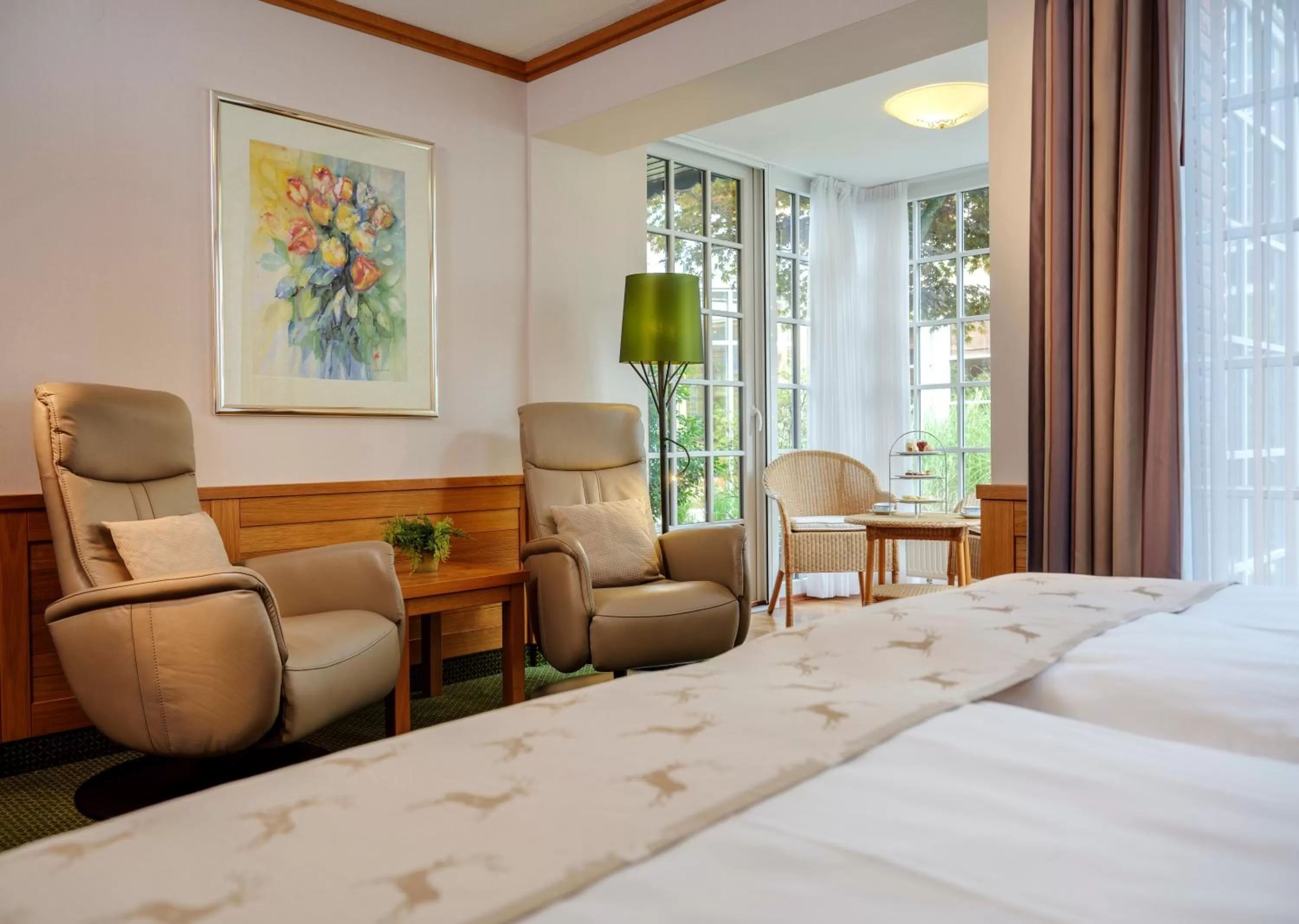 Seating area, Bed in Romantik Hotel Jagdhaus Eiden am See