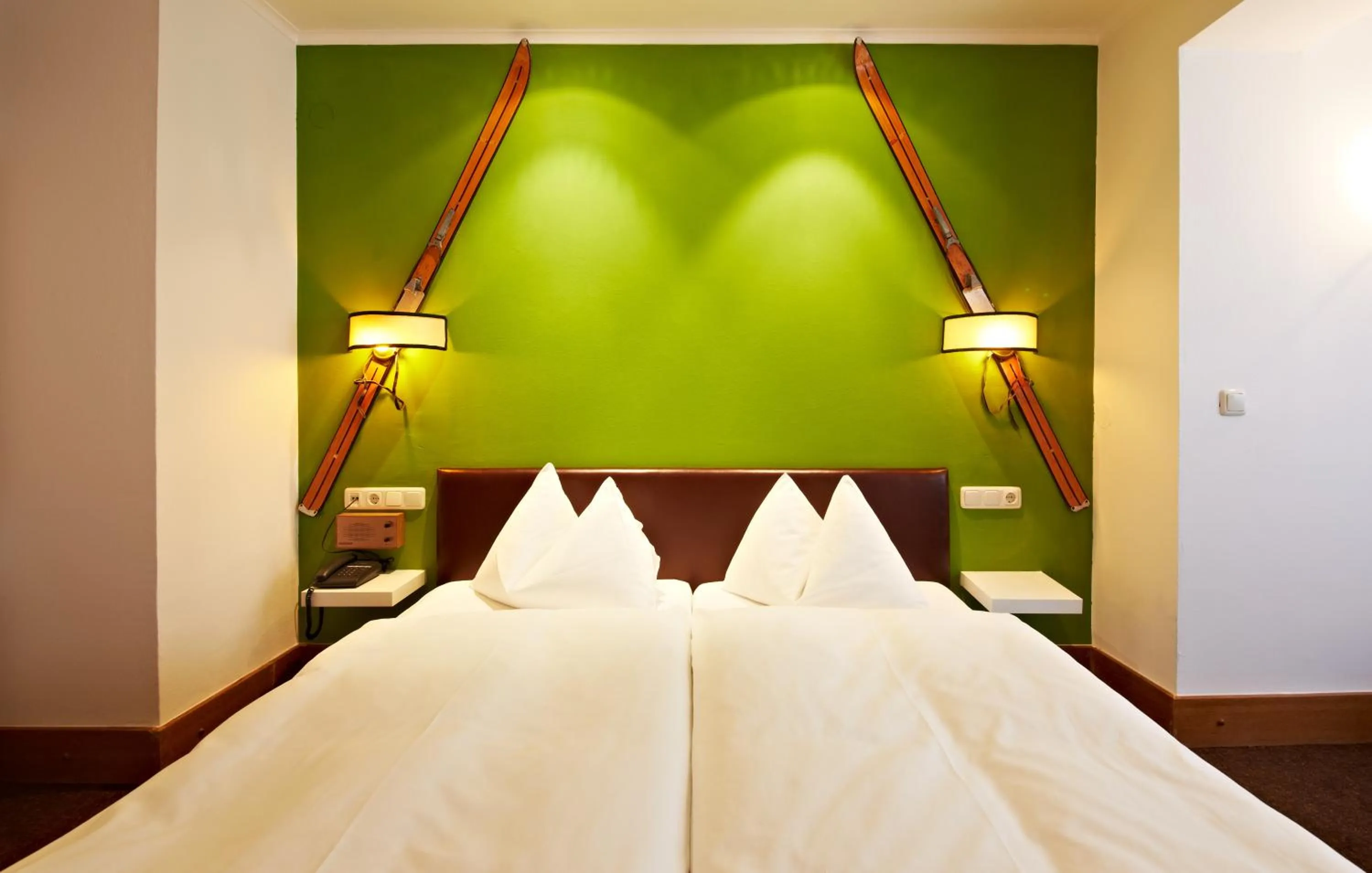 Bed in Hotel Saalbacher Hof