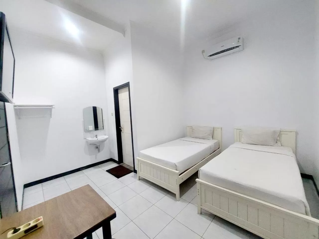 Bed in COZY STAY KUPANG