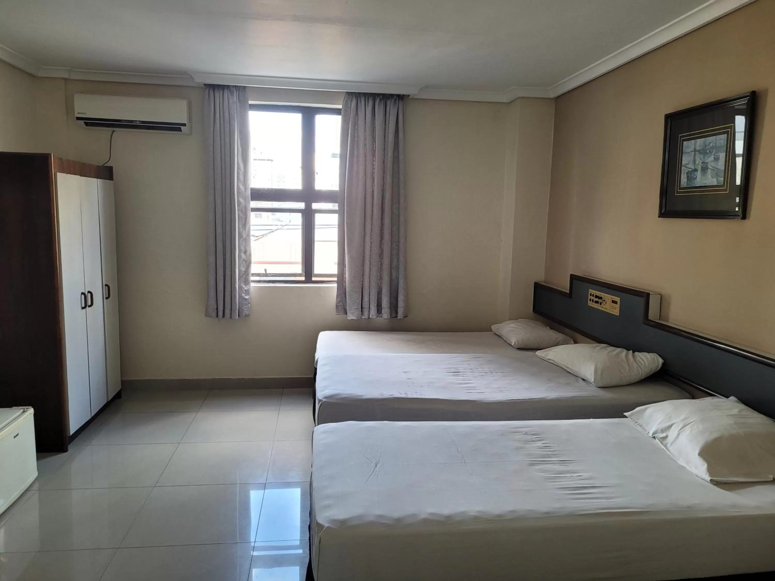 Bed in Hotel Estação Express