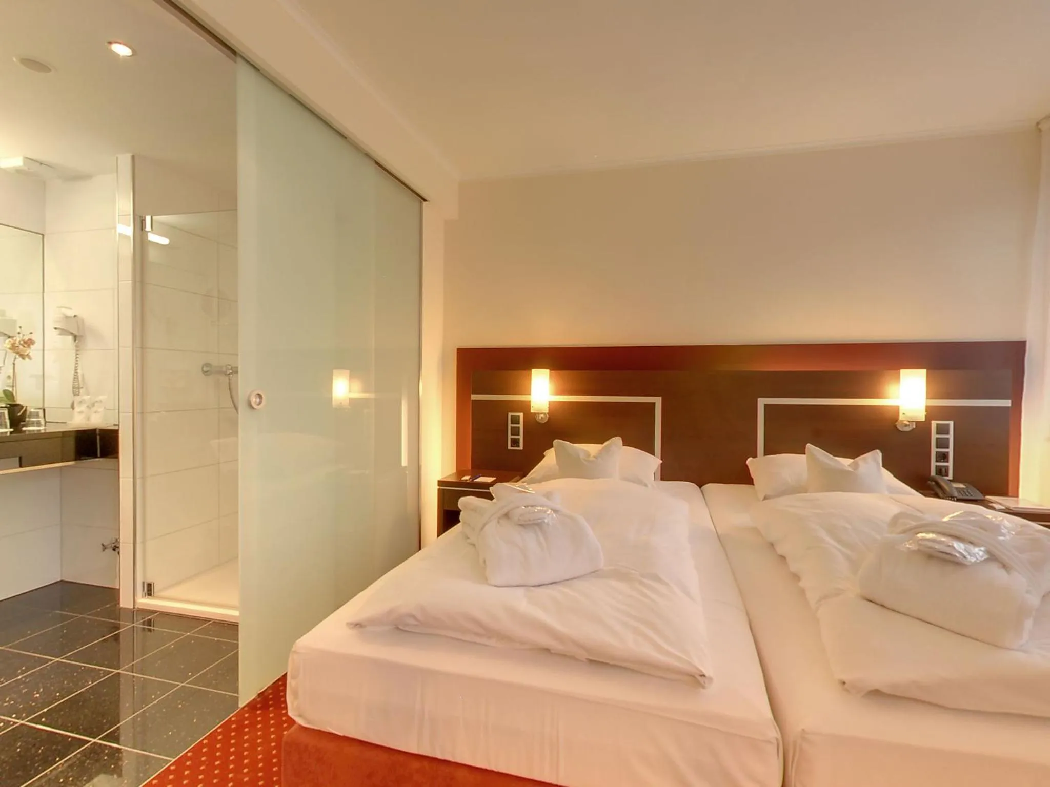 Photo of the whole room, Bed in Ringhotel Drees