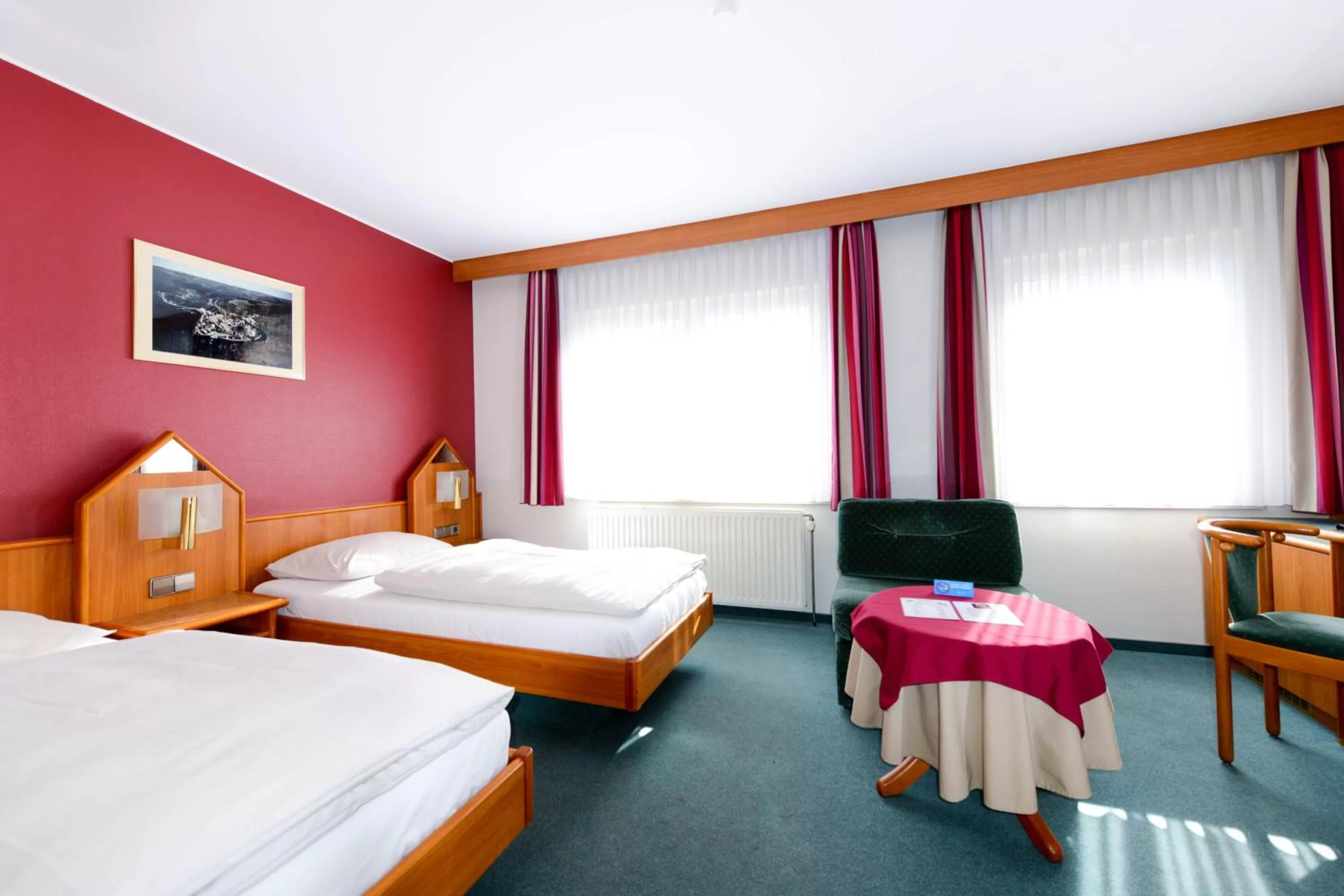 Living room, Bed in Hotel Christophe Colomb