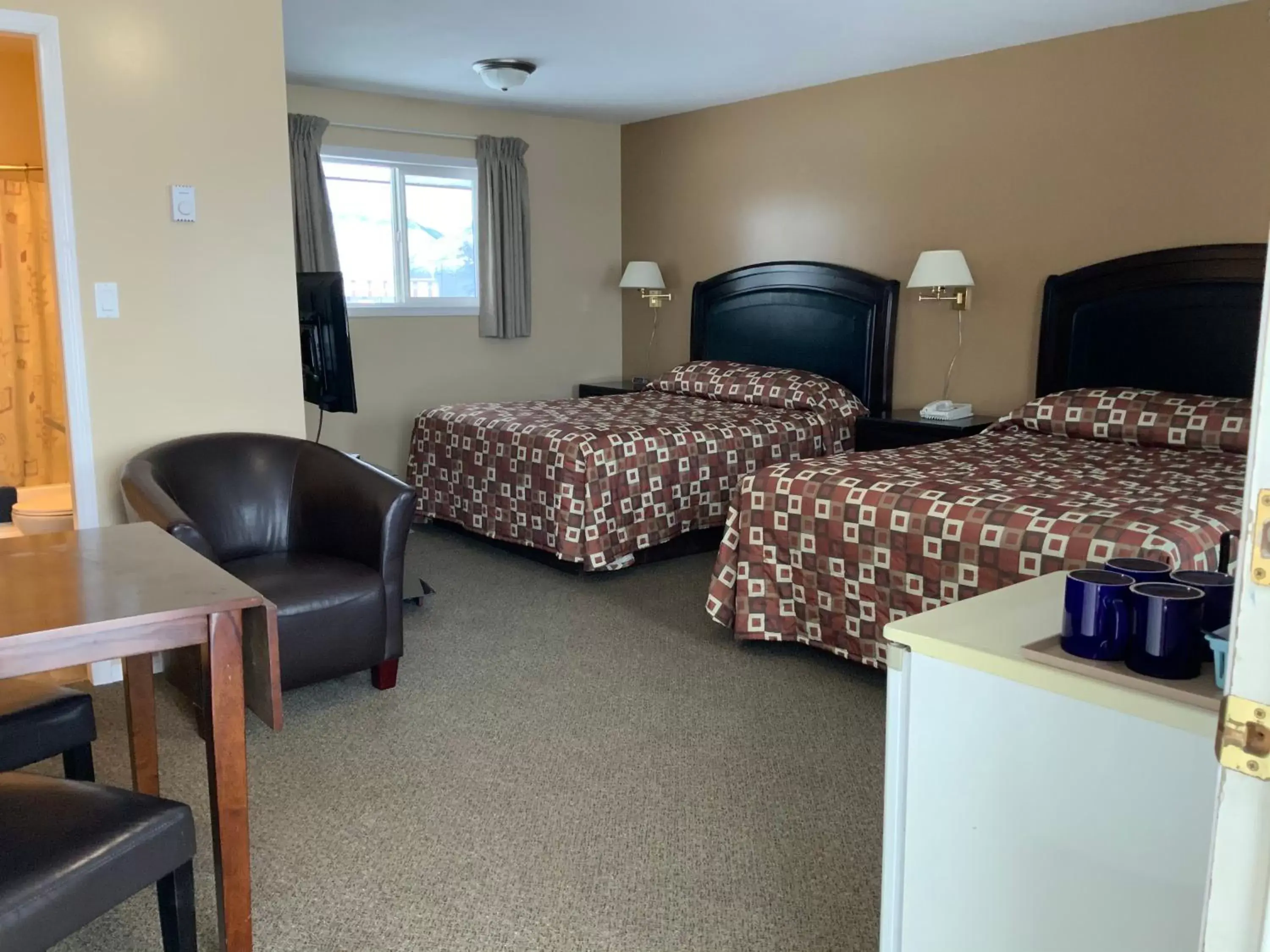 Queen Room with Two Queen Beds in Monte Carlo Motel Queen Room with Two Queen Beds in Monte Carlo Motel