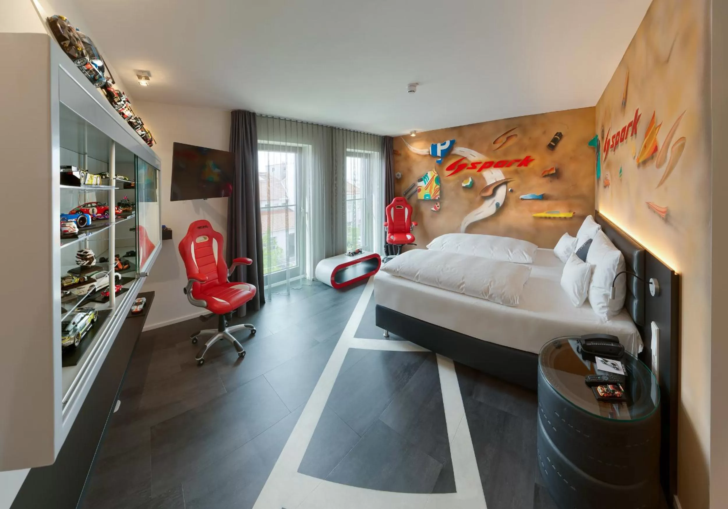 Photo of the whole room, Bed in V8 HOTEL Motorworld Region Stuttgart