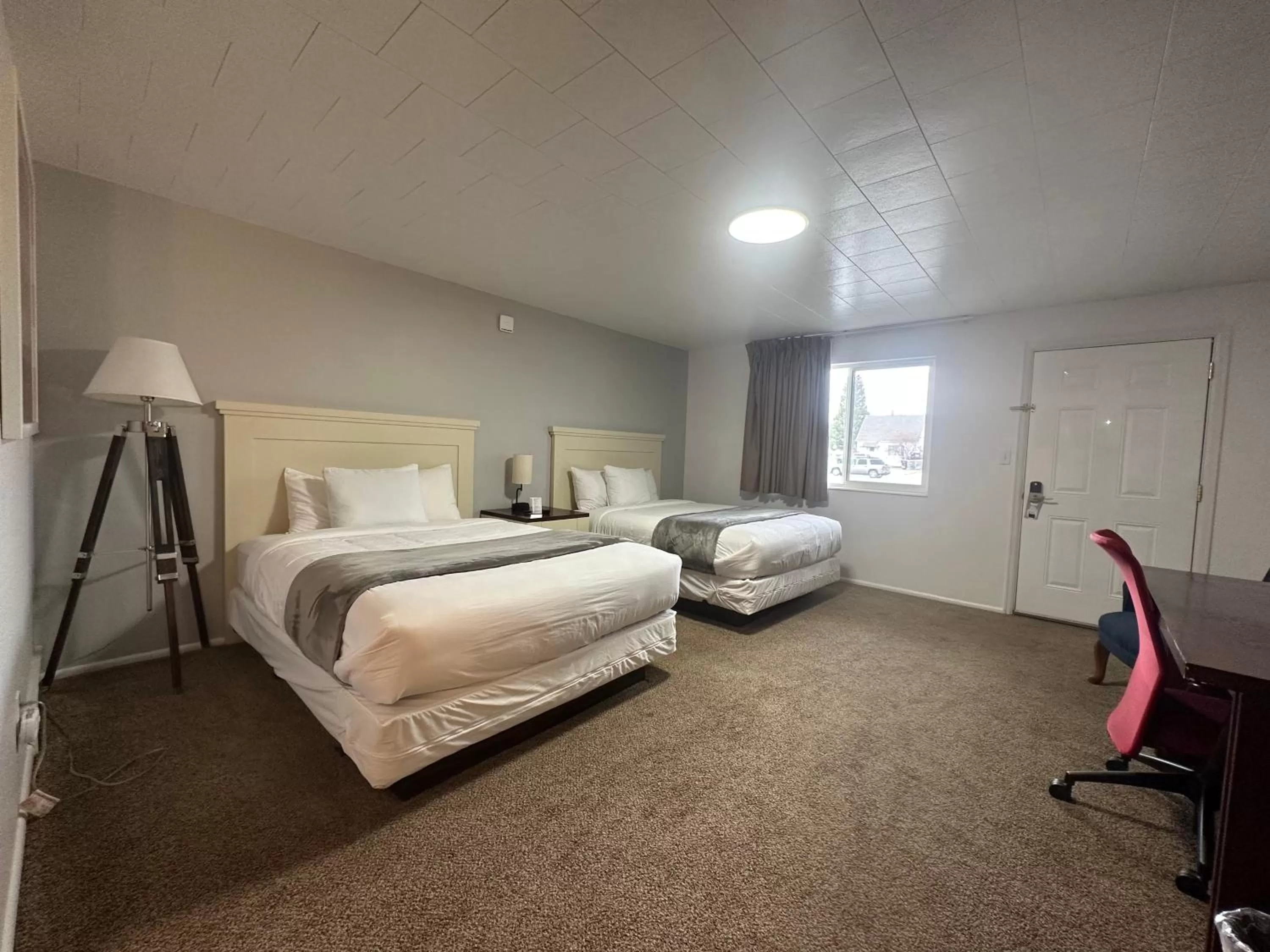 Bed in Fossil Butte Motel