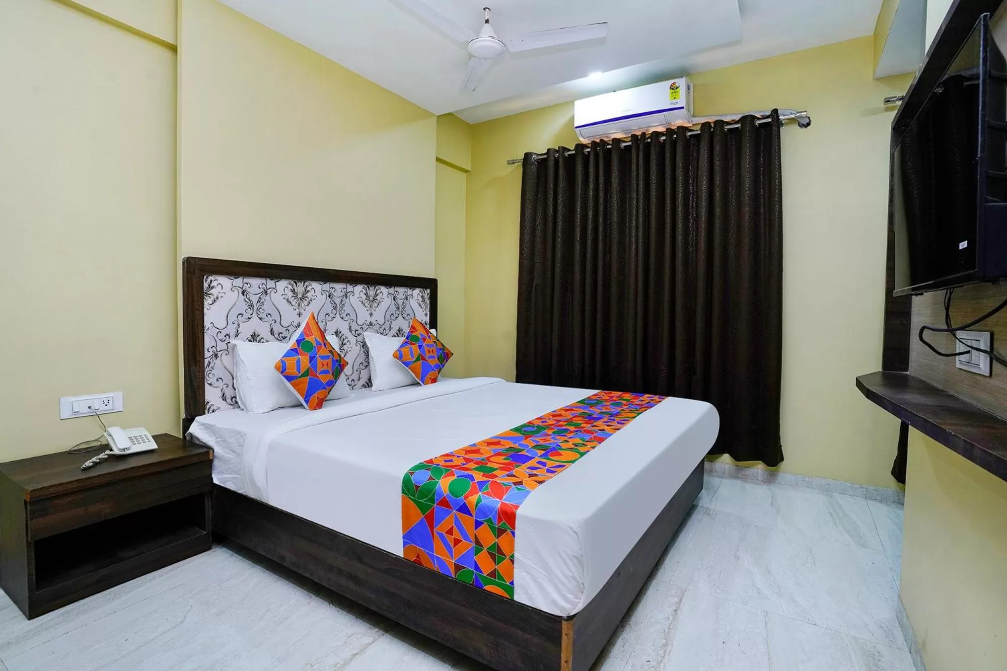 Bed in FabHotel Bhiwandi Palace