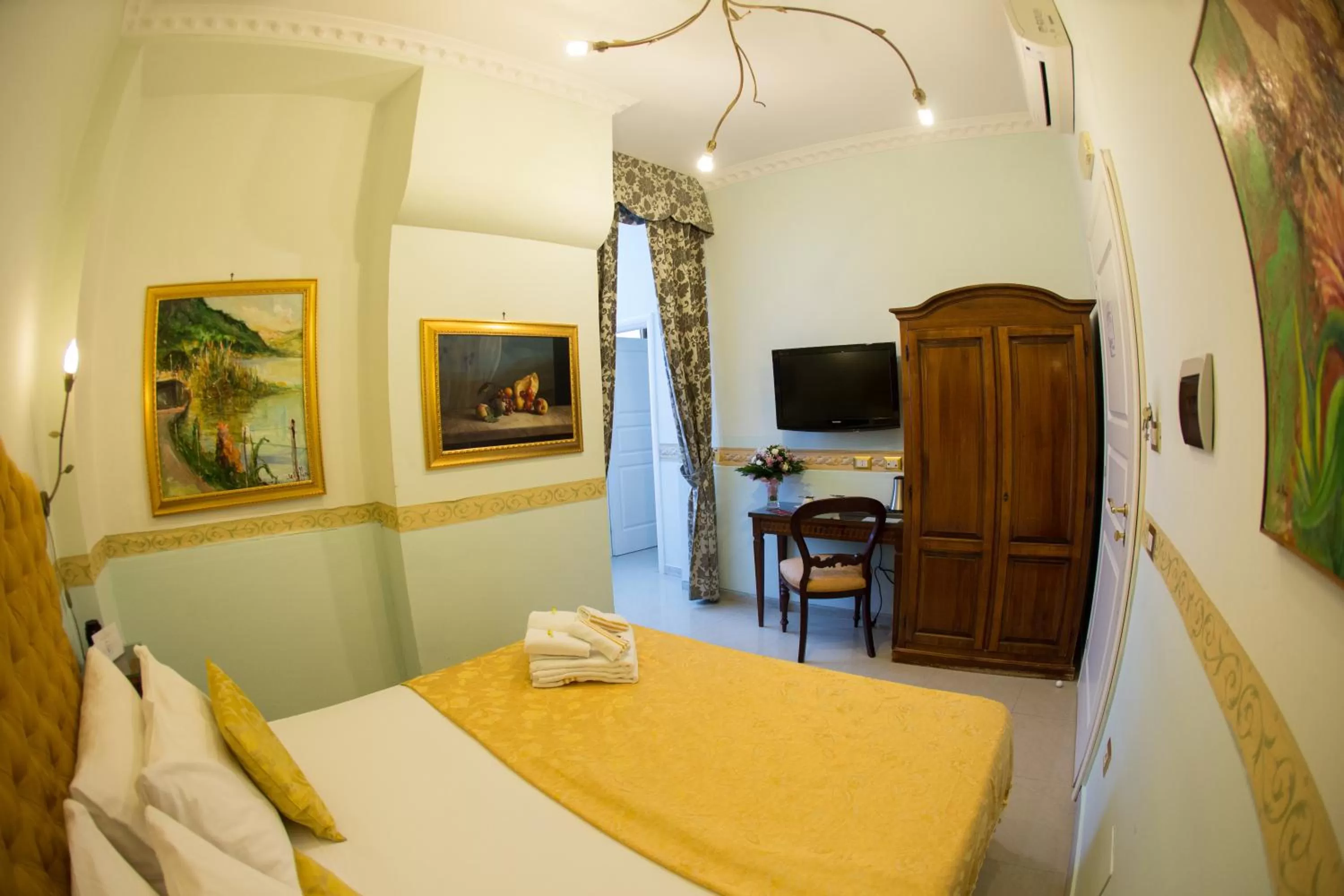 TV and multimedia, Bed in B&B Art Suite Santa Brigida