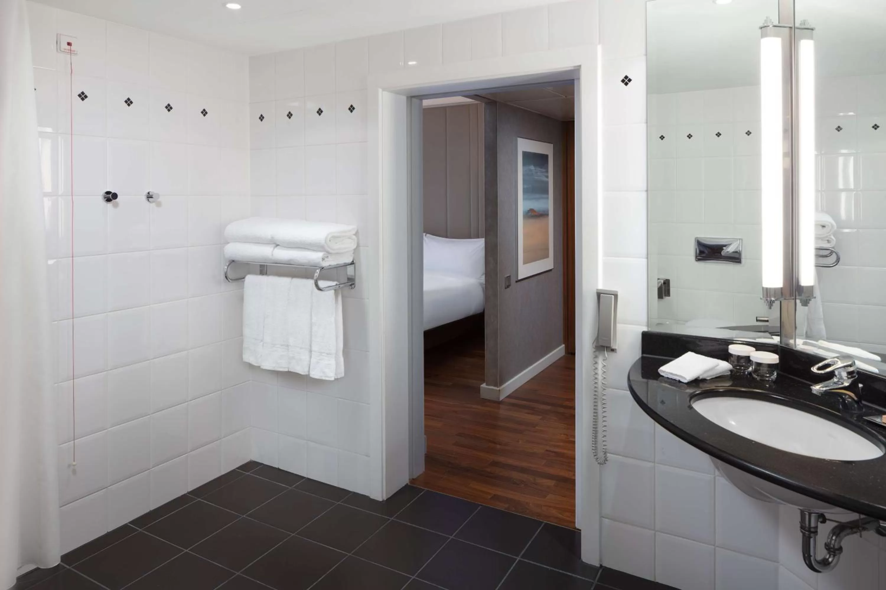 Bathroom, Bed in Hilton Berlin