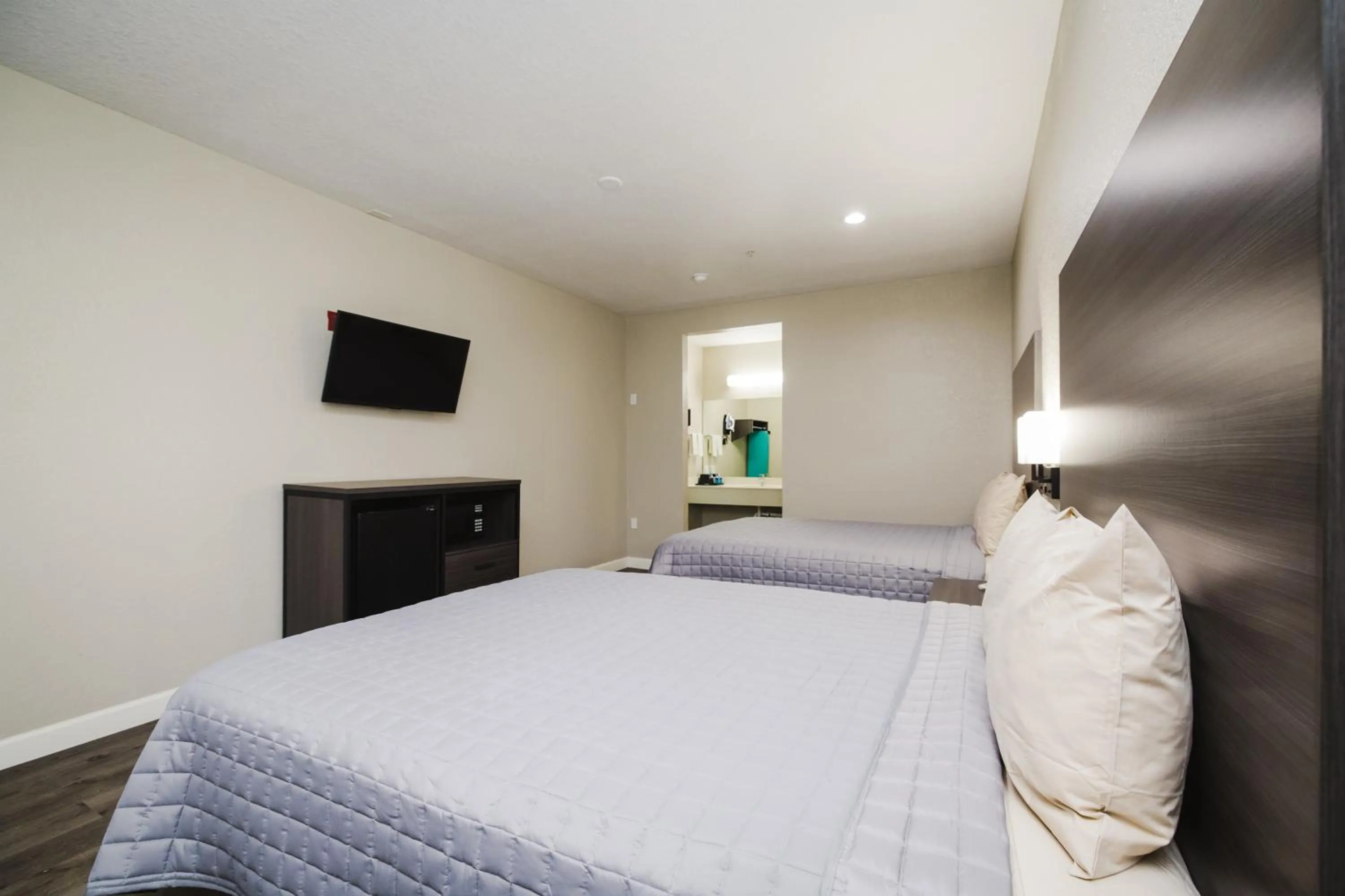 Bed in Winchester Inn and Suites Humble/IAH/North Houston