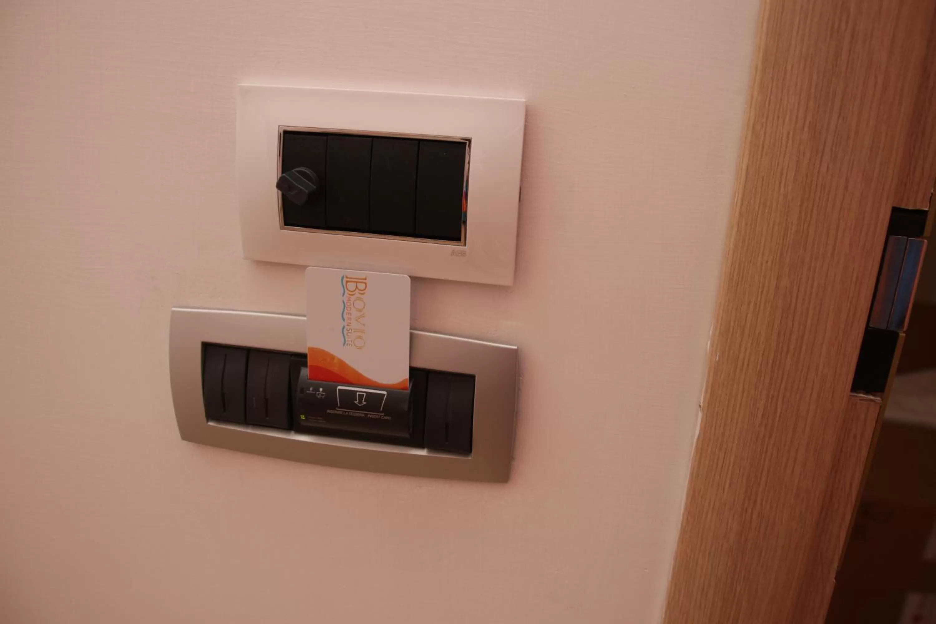 Decorative detail, TV/Entertainment Center in Bovio Modern Suite