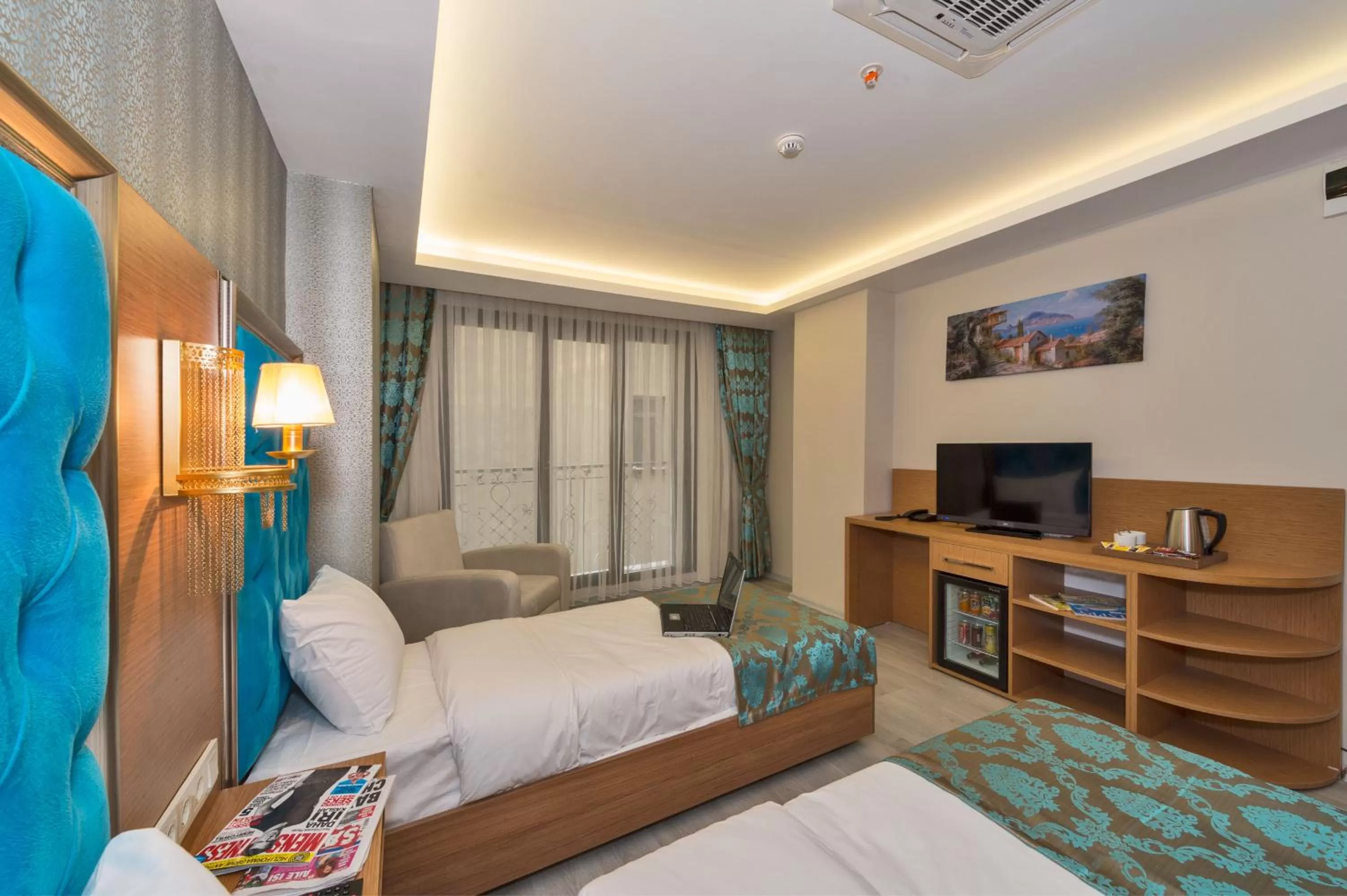 Seating area, Bed in Grand Palace Hotel