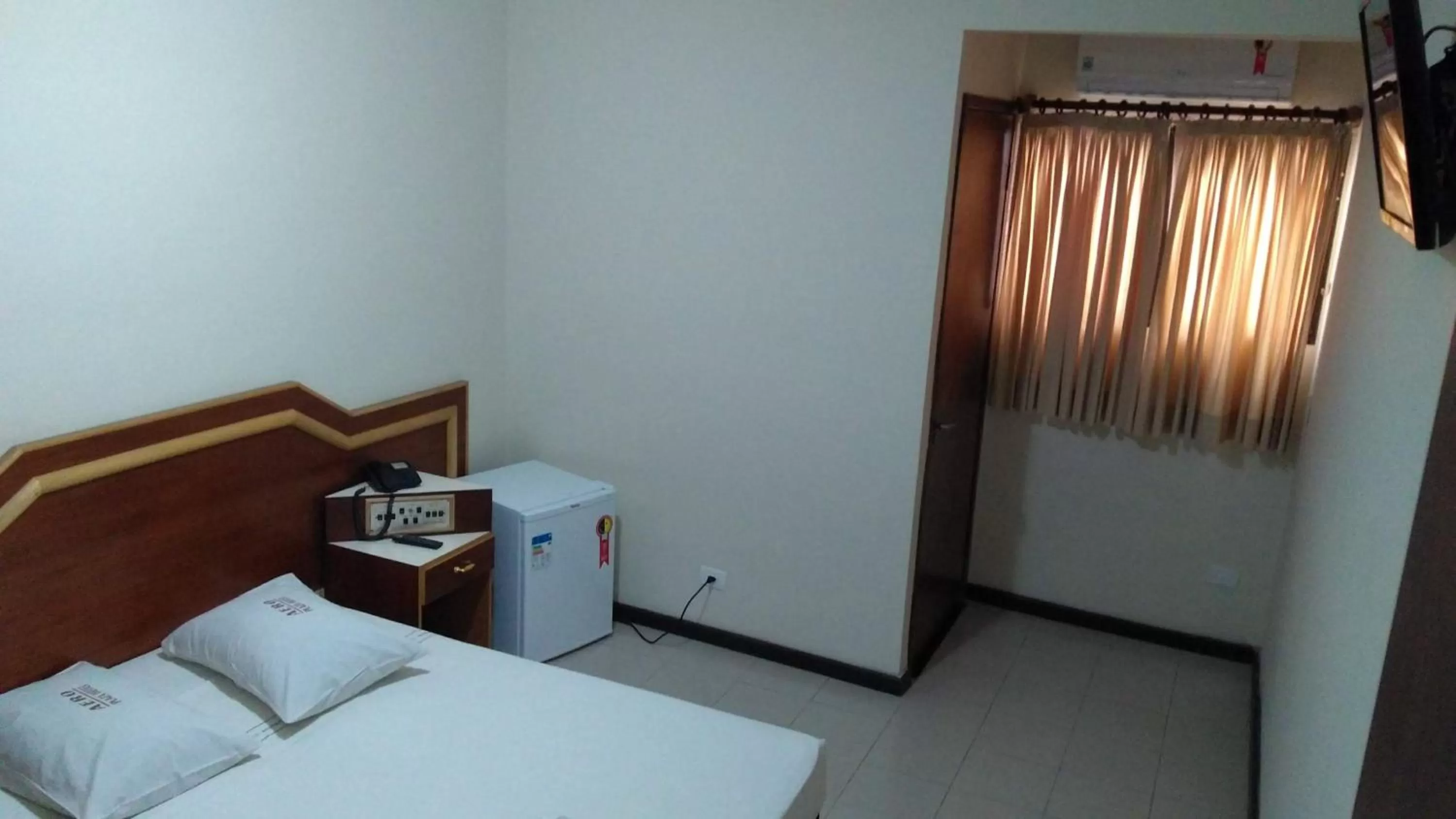 Photo of the whole room, Bed in Aero Plaza Hotel