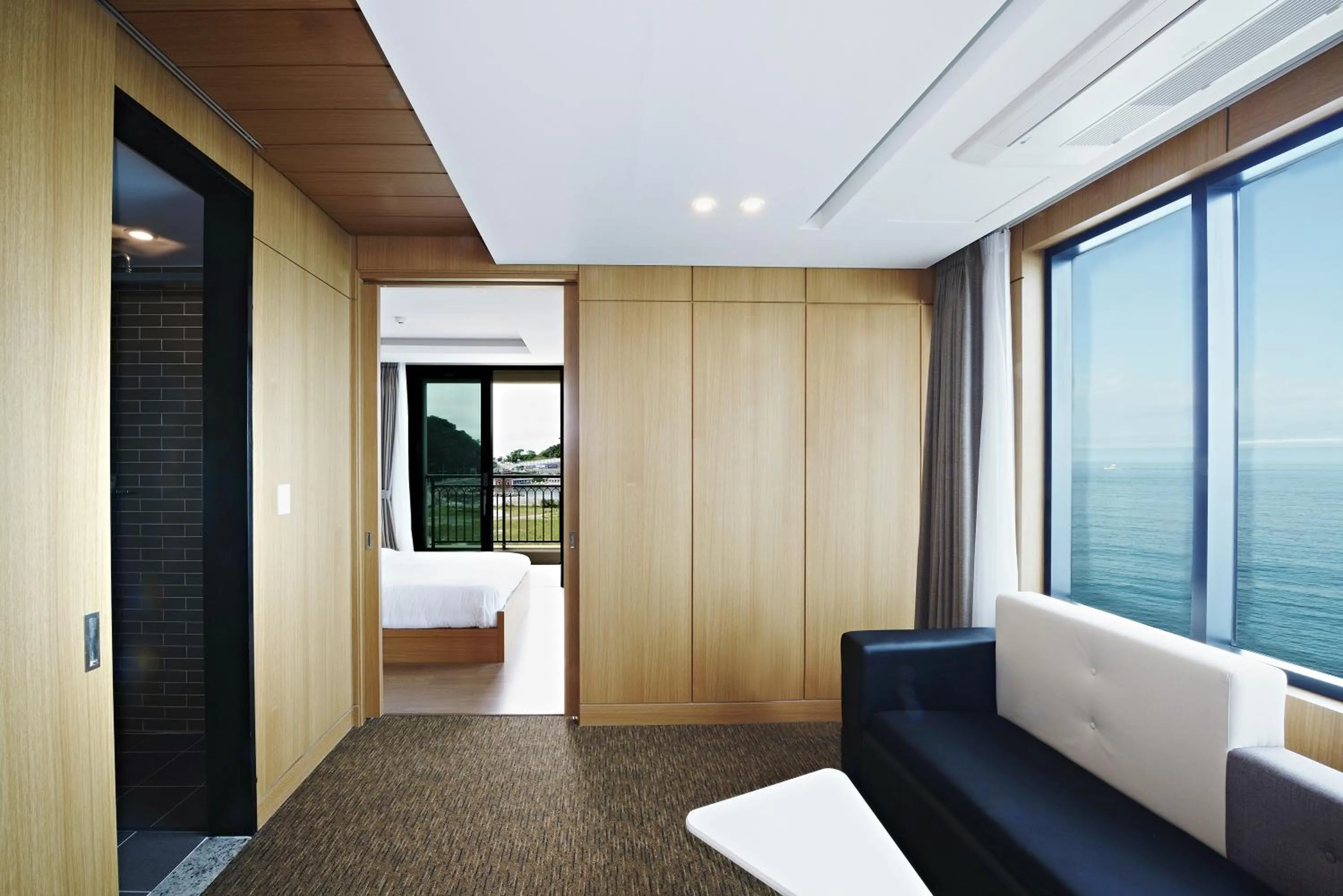 Living room, Bed in Ramada by Wyndham Gangwon Sokcho