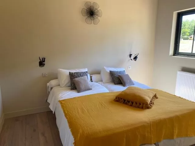 Bed in Écolodges du Golf du Sauternais