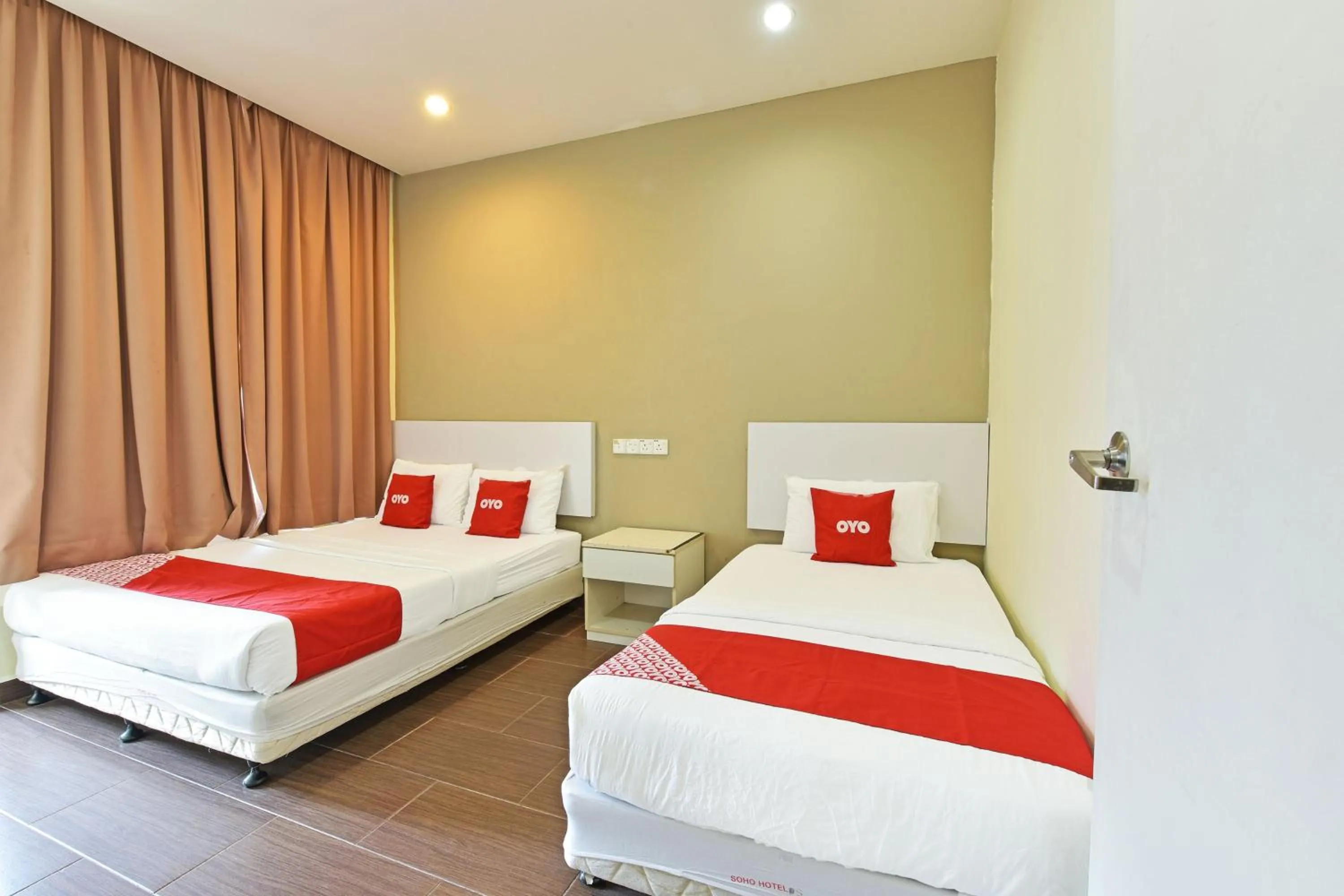 Bedroom, Bed in OYO 90853 New Soho Hotel