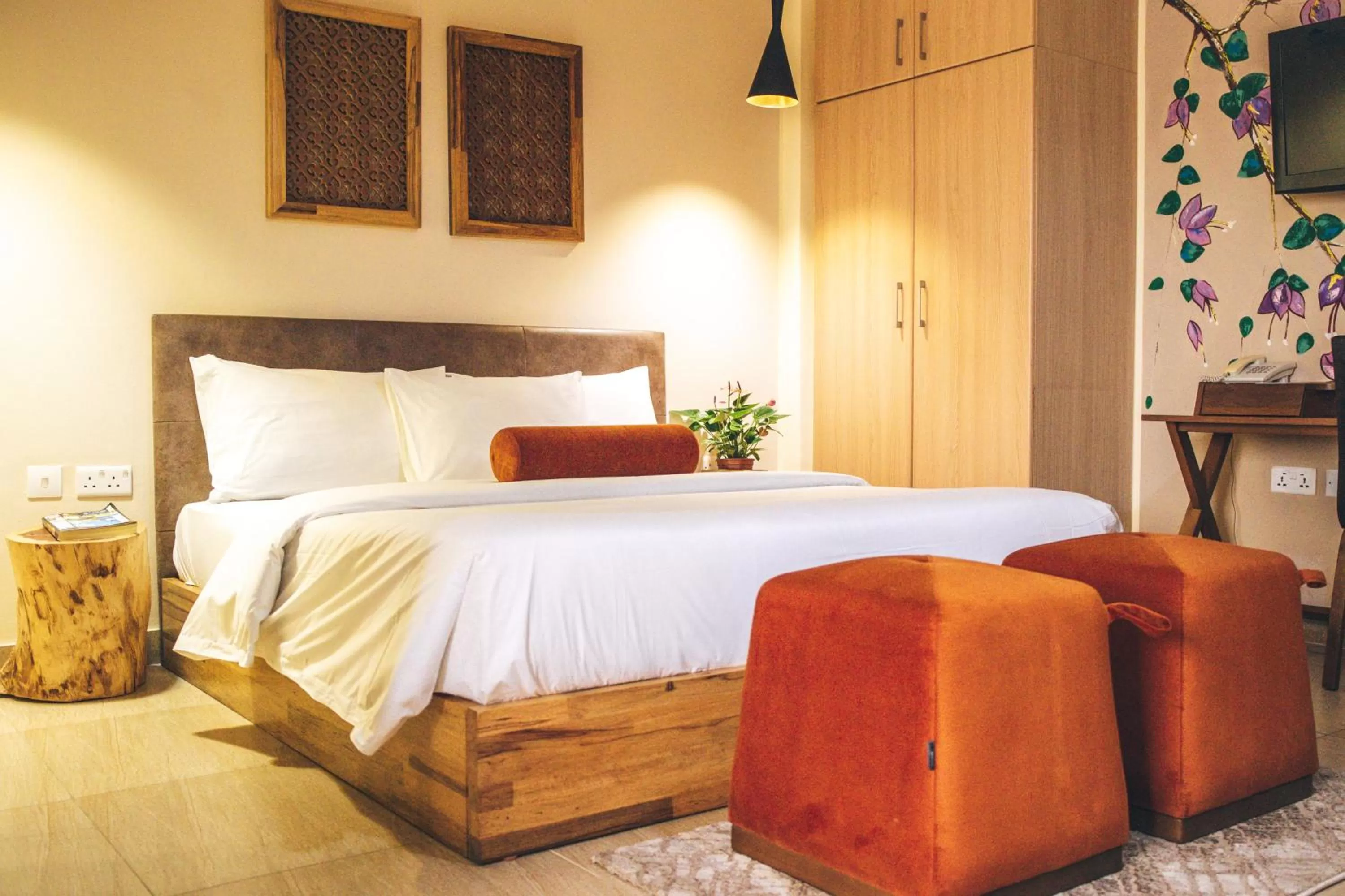 Bed in Roots Hotel Apartment