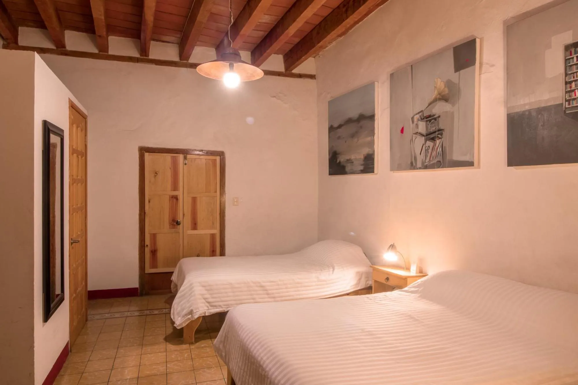 Bed in Hotel Meson Cuevano