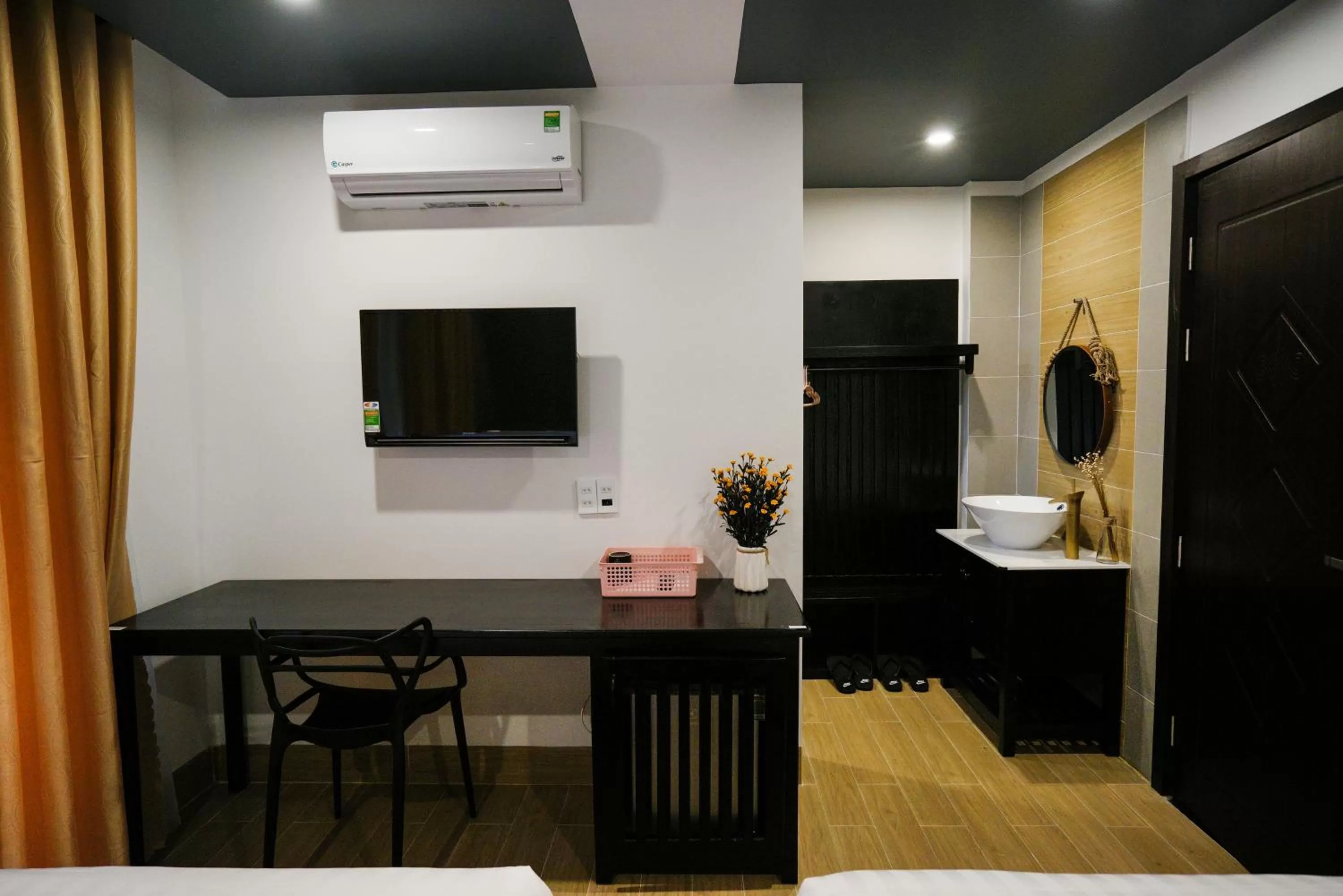 Communal lounge/ TV room in Maison Khoi Homestay