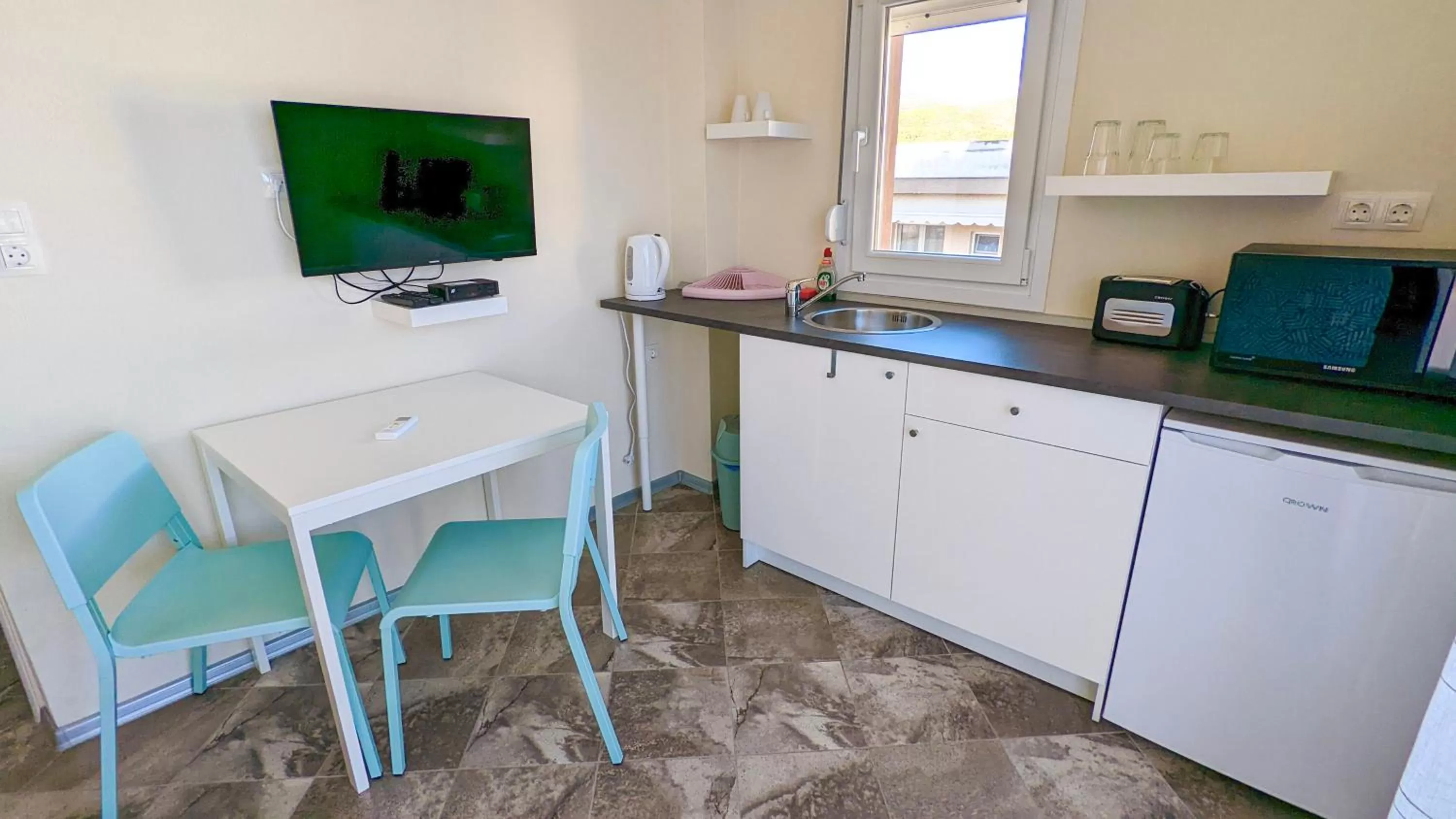 Kitchen or kitchenette in GreenCity Kavala