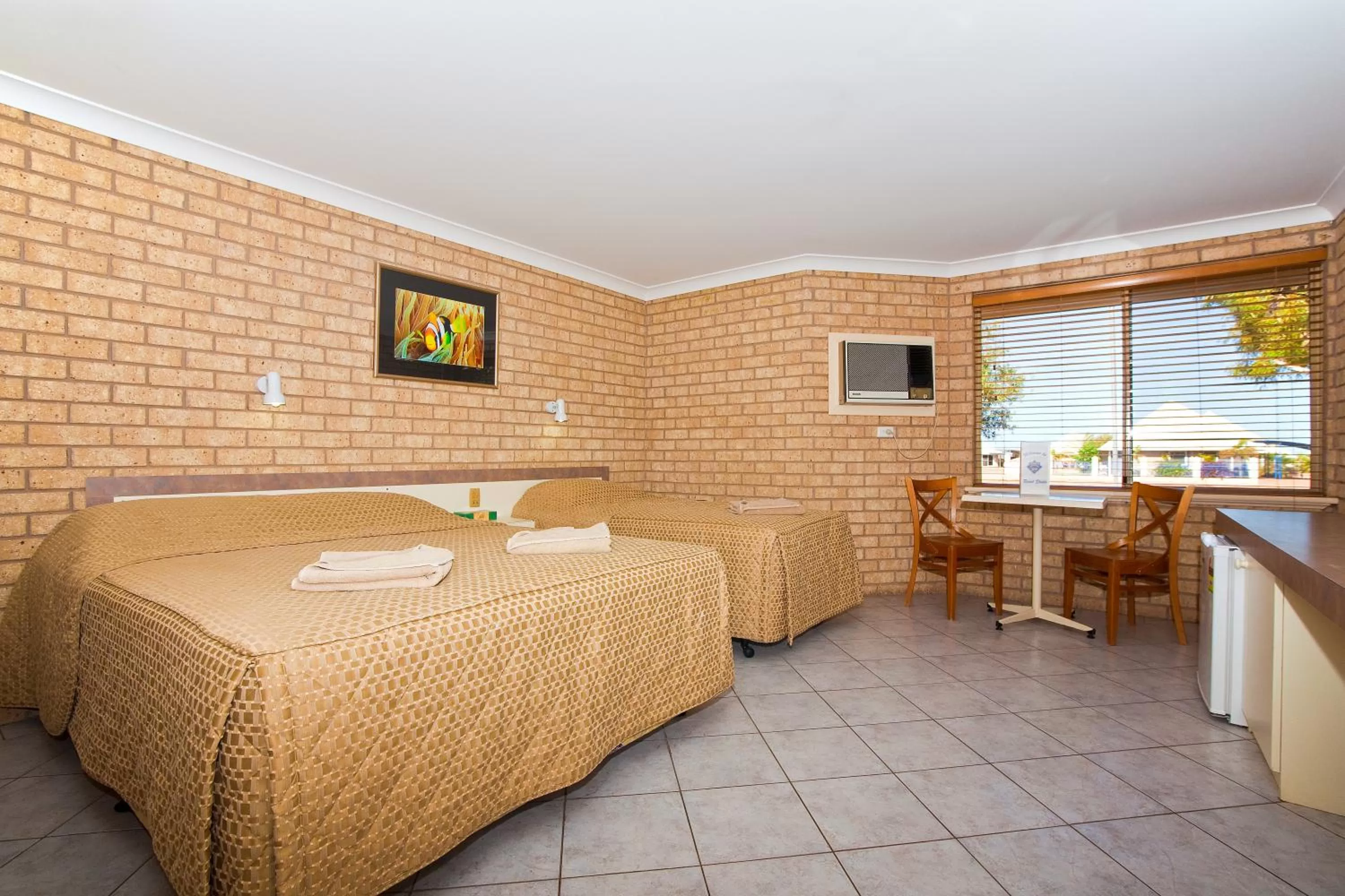 Bed in Potshot Hotel Resort