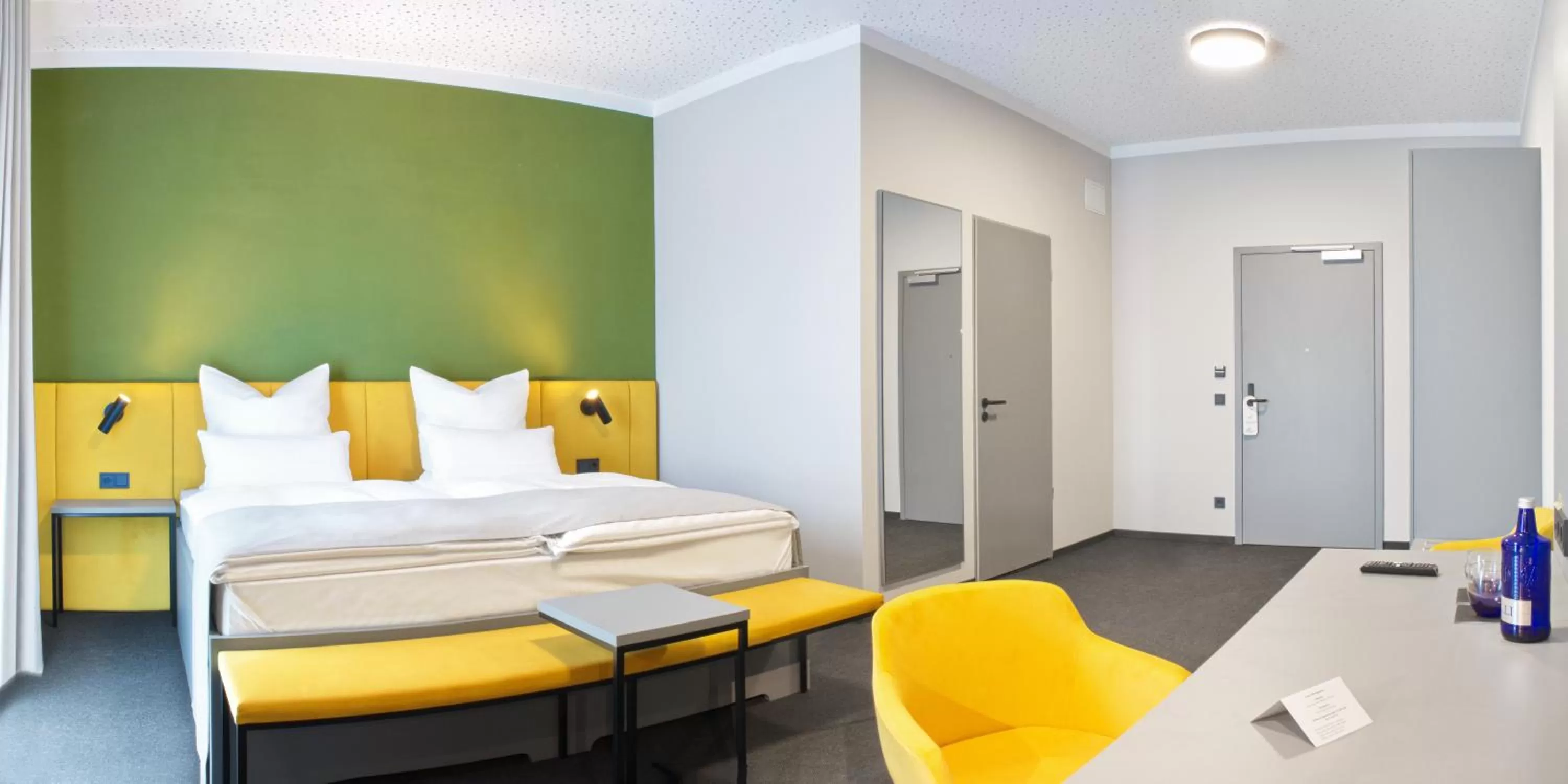 Seating area, Bed in Hotel Adler Münster