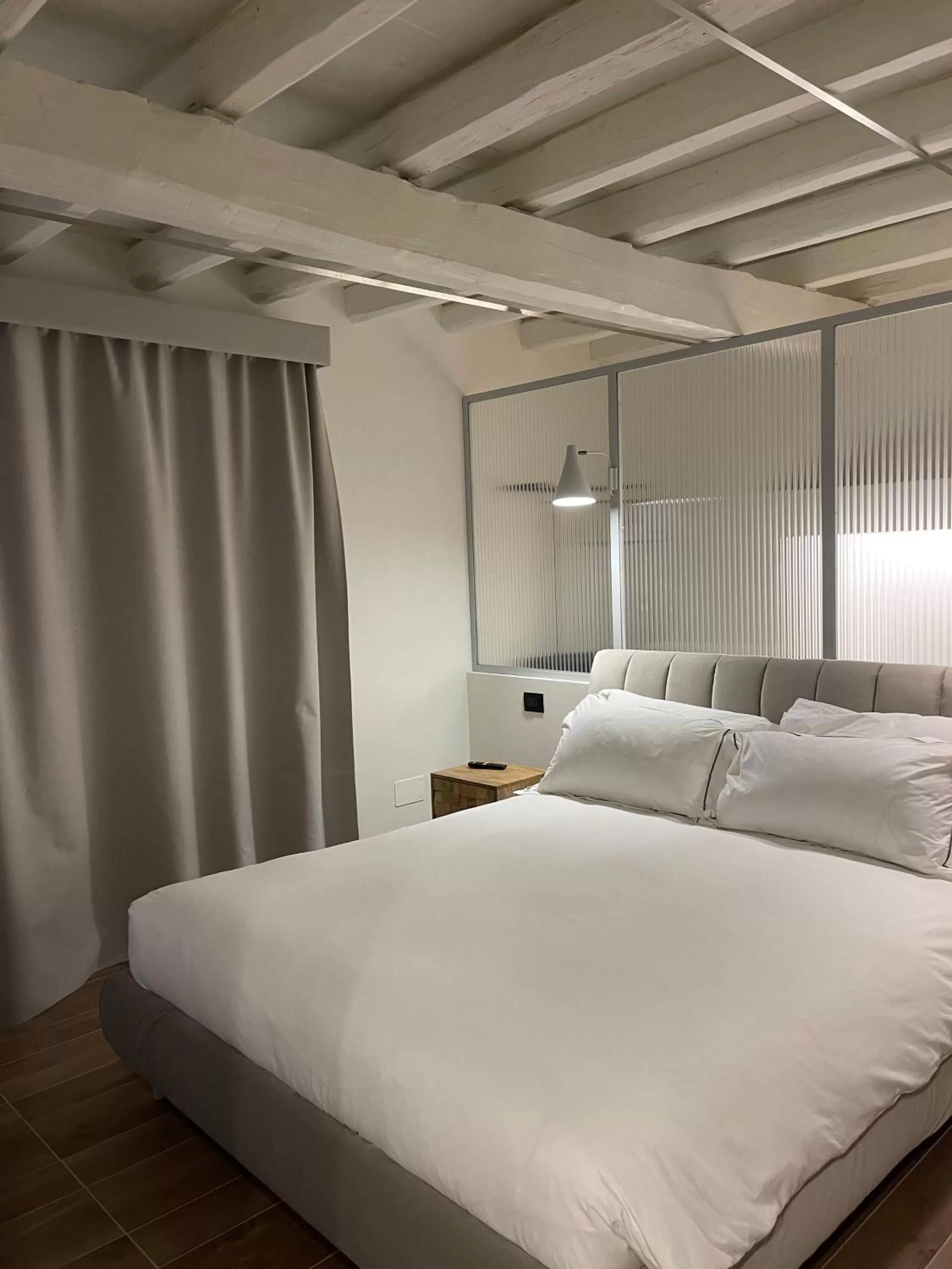 Bedroom, Bed in Raha Suites