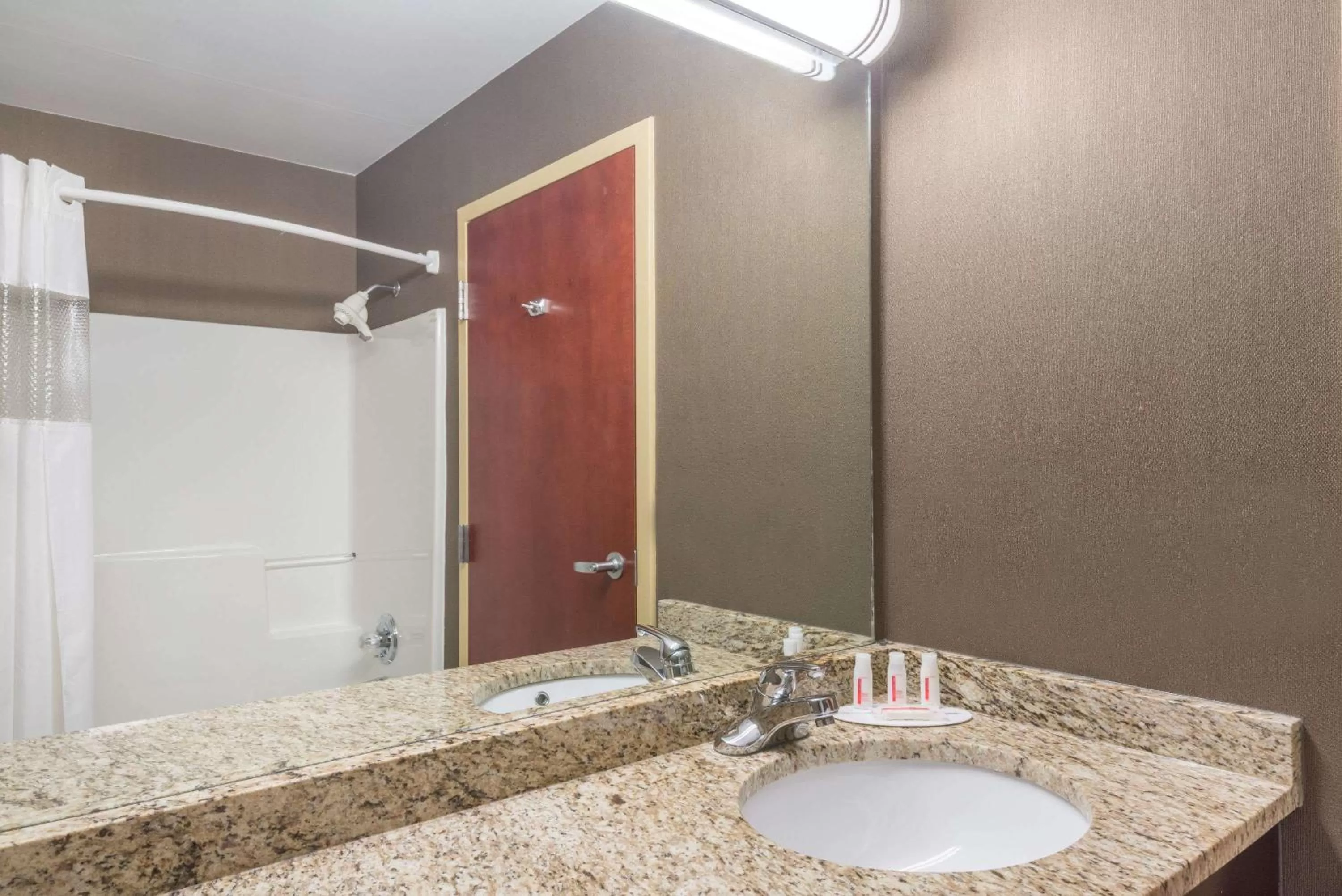 Bathroom in Ramada by Wyndham Catlettsburg Ashland